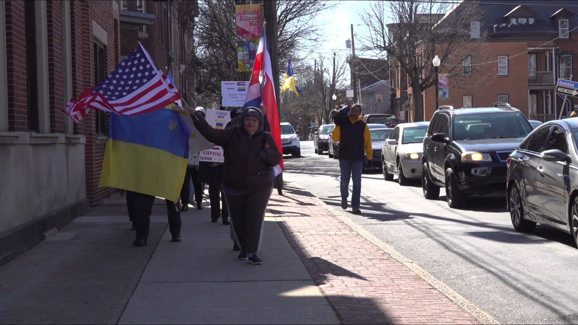 The ralliers waved many different flags as they marched down Derry Street but carried a single message: the world stands behind Ukraine.