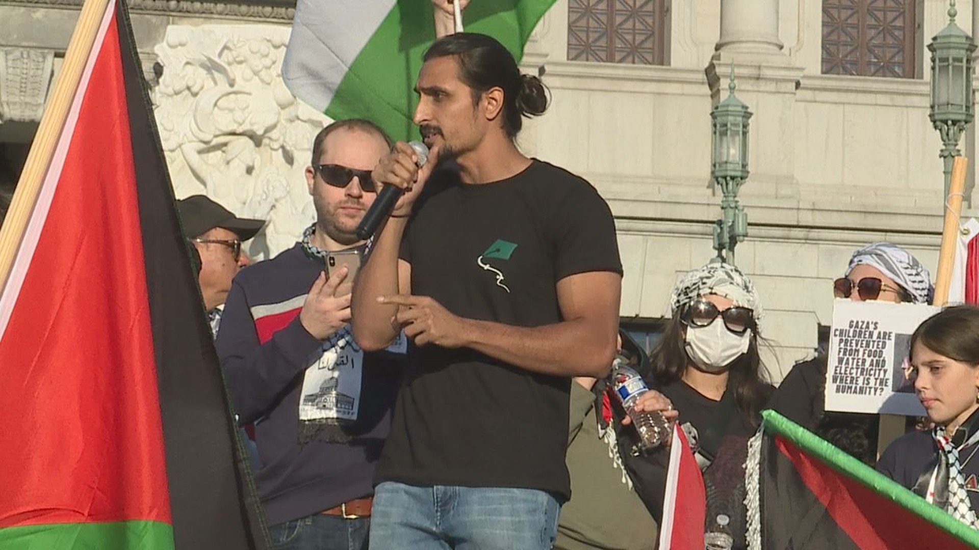 Harrisburg resident and Palestinian-American Omar Mussa interviewed prior to the start of Friday's rally on the steps of the state capitol.