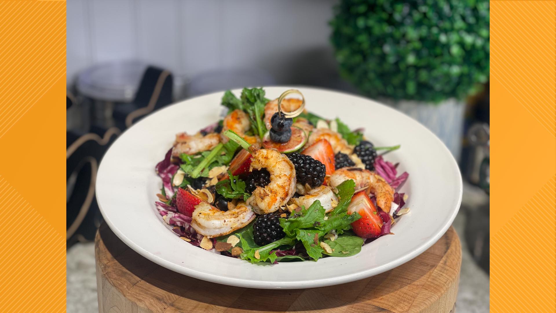 Olivia's lighter end of summer fare includes a Berry Almond Salad topped with grilled Shrimp. A Dirty Soda cocktail has summer flair while introducing fall flavors.