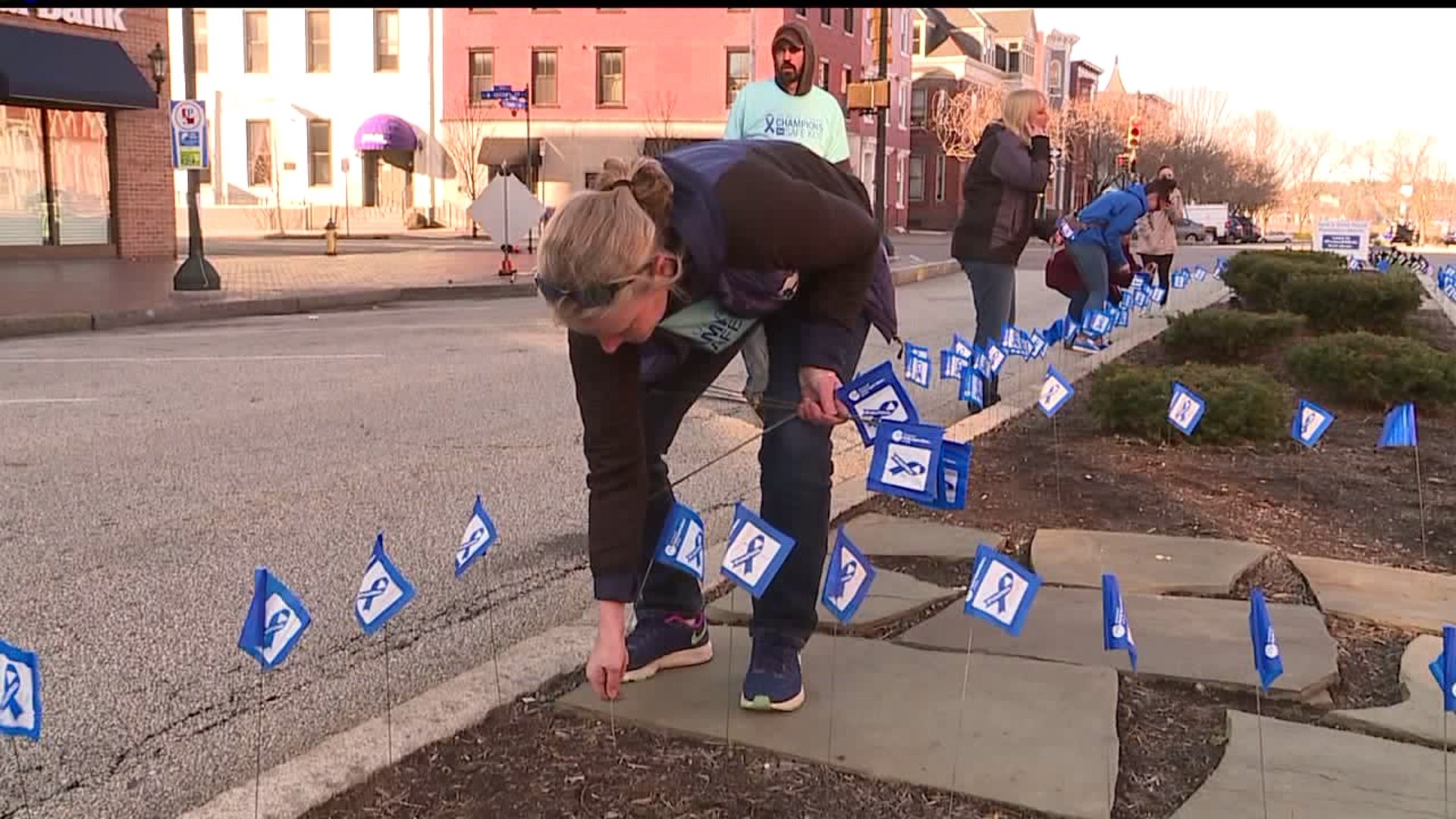 Blue lights and flags honor victims of child abuse in Pennsylvania
