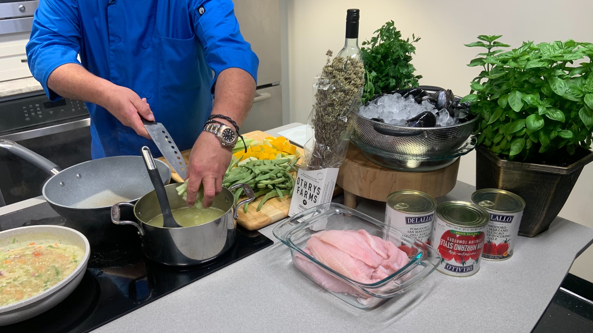 Summer is the season of seafood... and fresh veggies! Olivia's prepares a dish with room for both: crispy catfish served over rice pilaf and garden-style mussels.