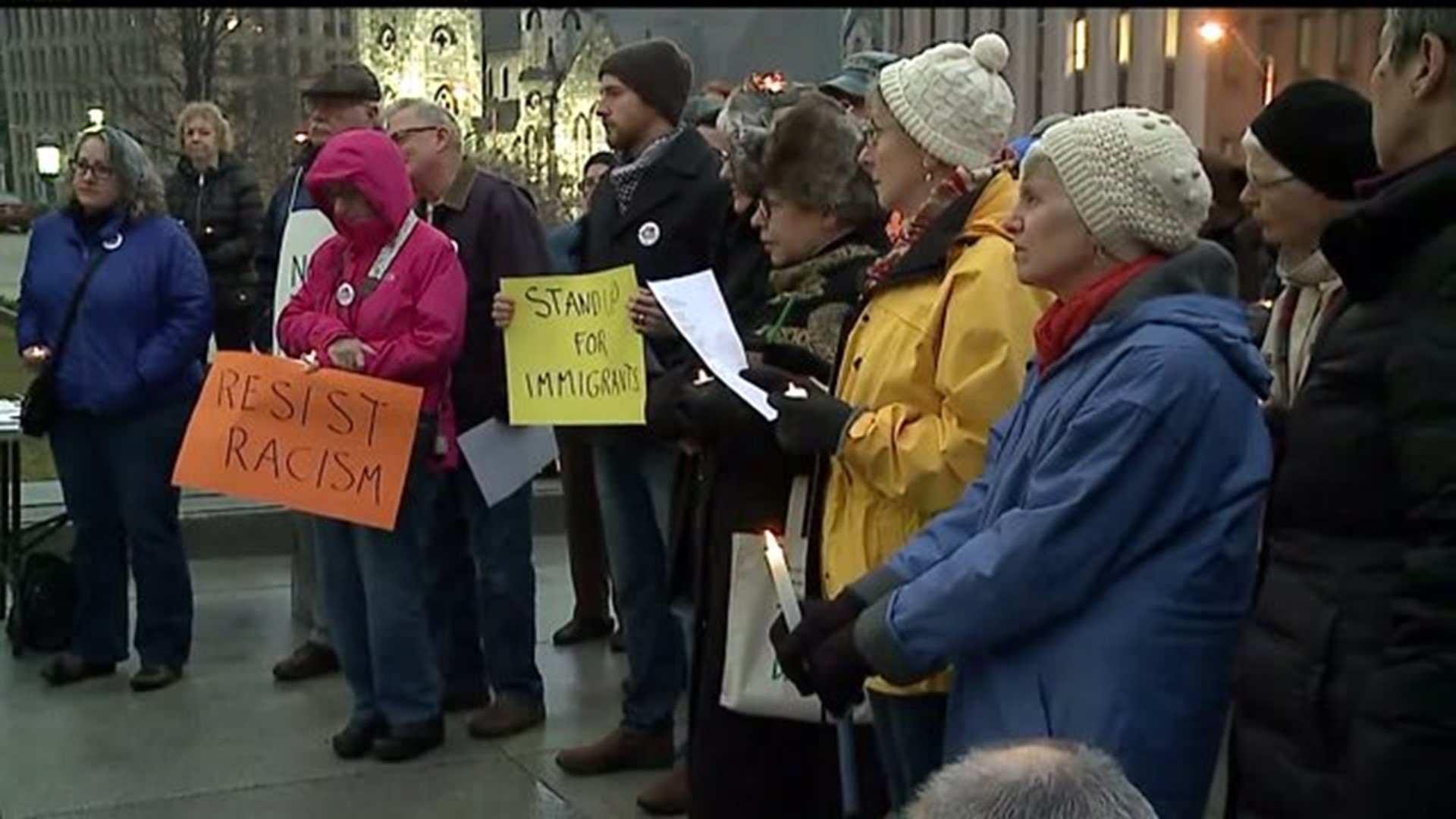 Demonstrators hold vigil to organize resistance against Trump
