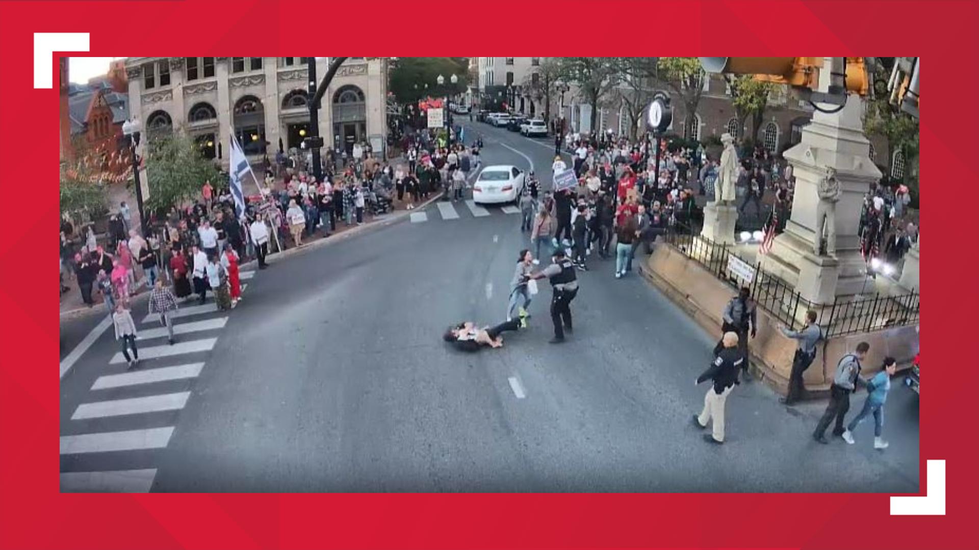 Surveillance footage from the Lancaster Safety Coalition shows a photographer shoved to the ground by a Lancaster Police officer.