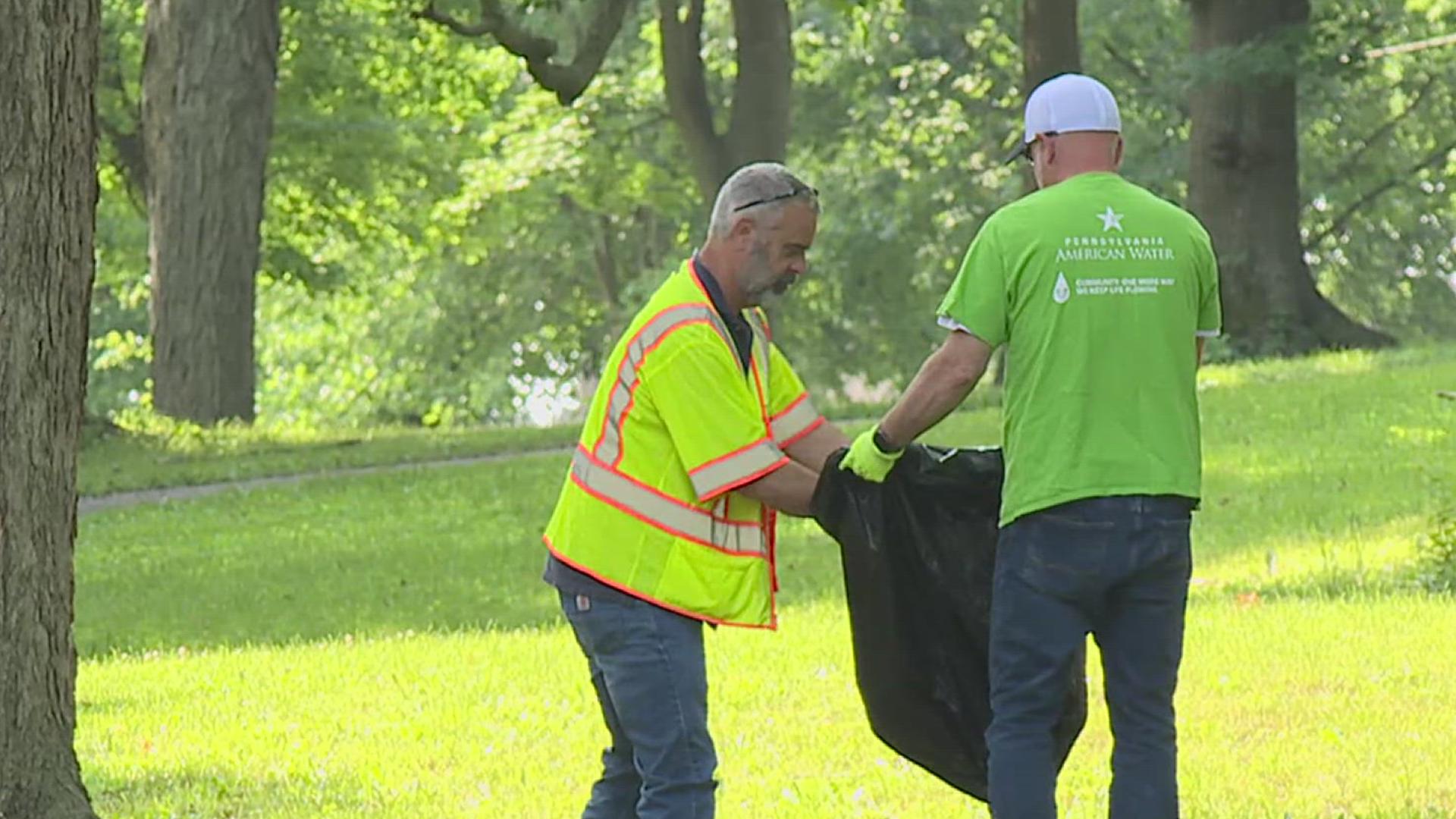 The Pennsylvania American Water Company helped clean up Farquhar Park on Wednesday, and presented a $10,000 check to the York City Parks Conservancy.