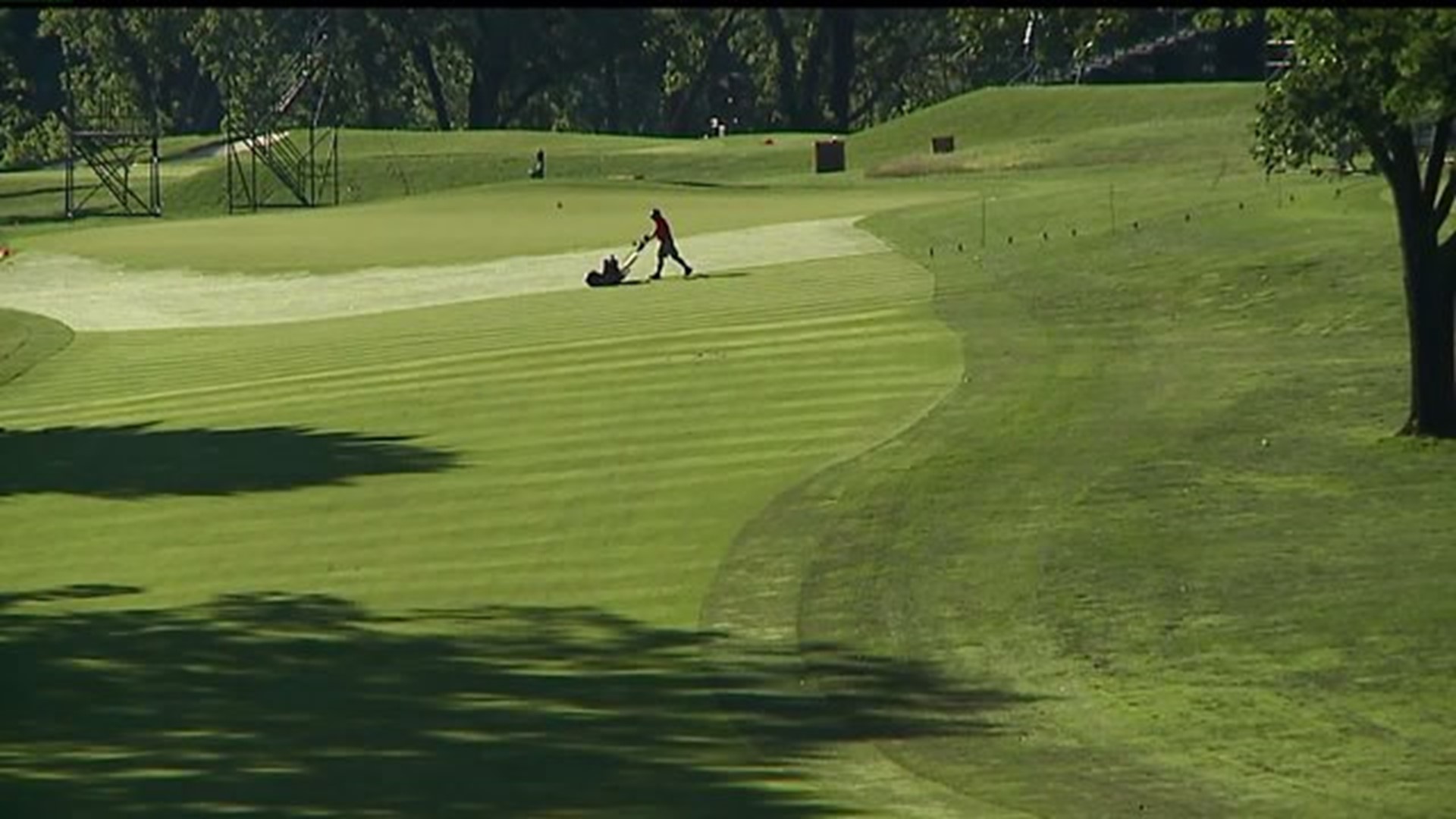 Prepping the greens for the 2015 U.S. Women`s Open