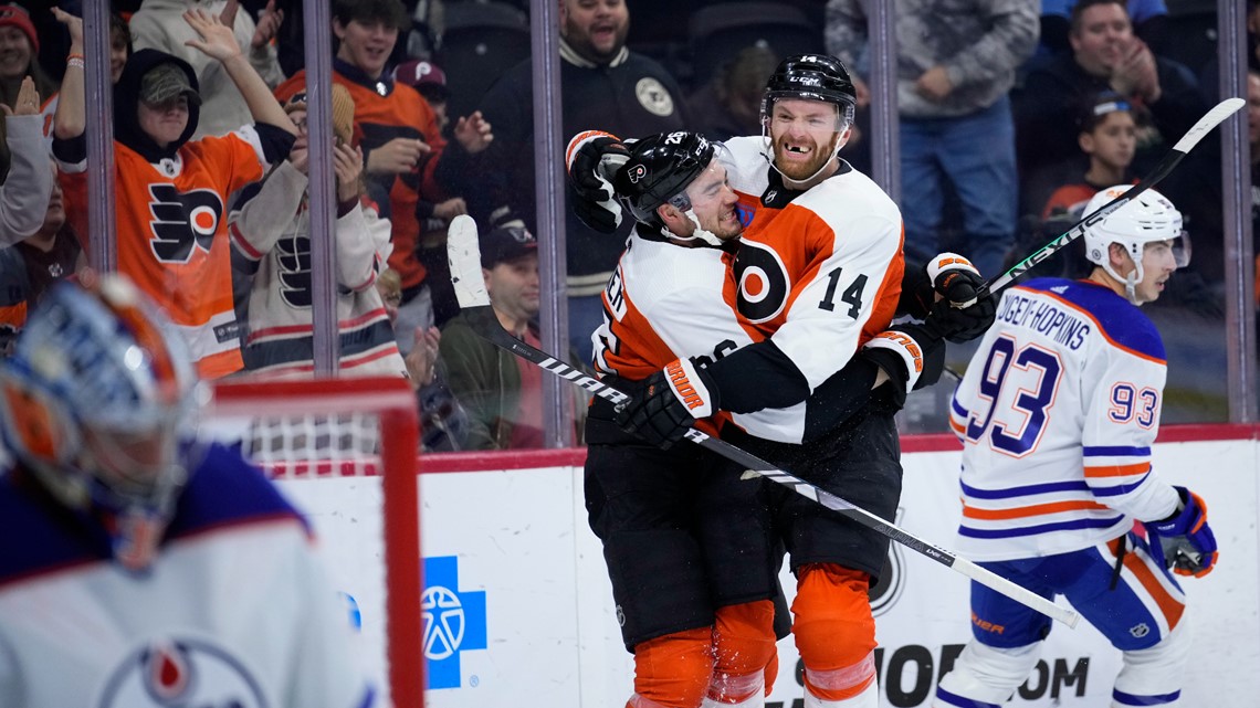 Couturier scores on penalty shot, Hart makes 25 saves to help Flyers beat  Canucks 2-0, World