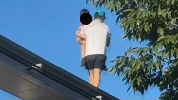 Man labeled a hero after saving missing boy stuck 100ft in air on monorail track