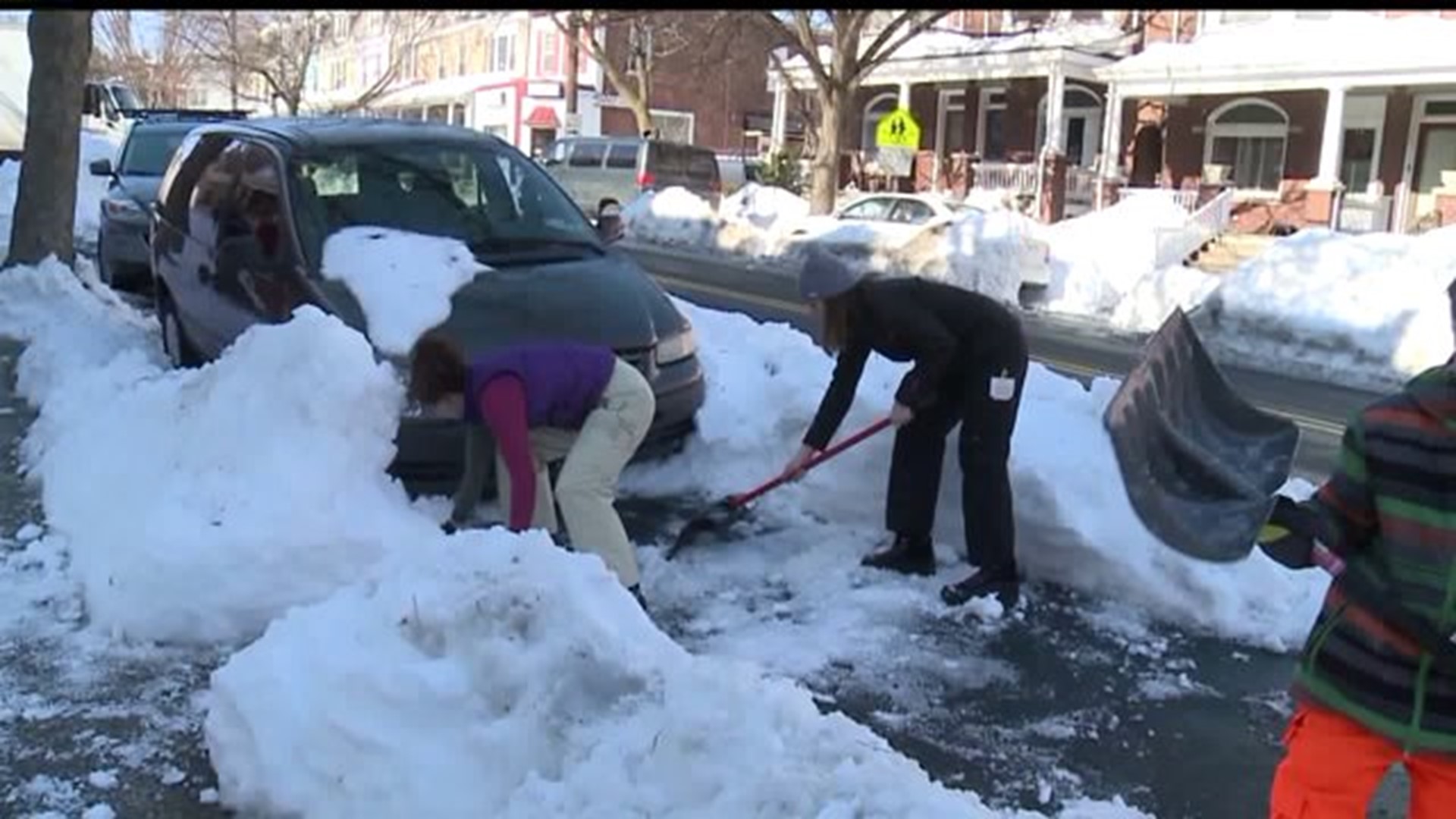 Mom volunteers kids to help clear snow in Lancaster City