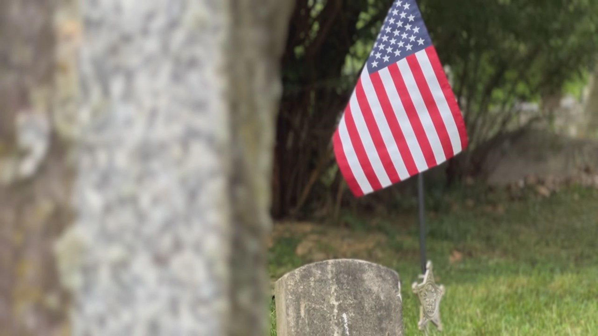 Centuries worth of heroes buried at Woodward Hill Cemetery in Lancaster were honored with a flag for Memorial Day.