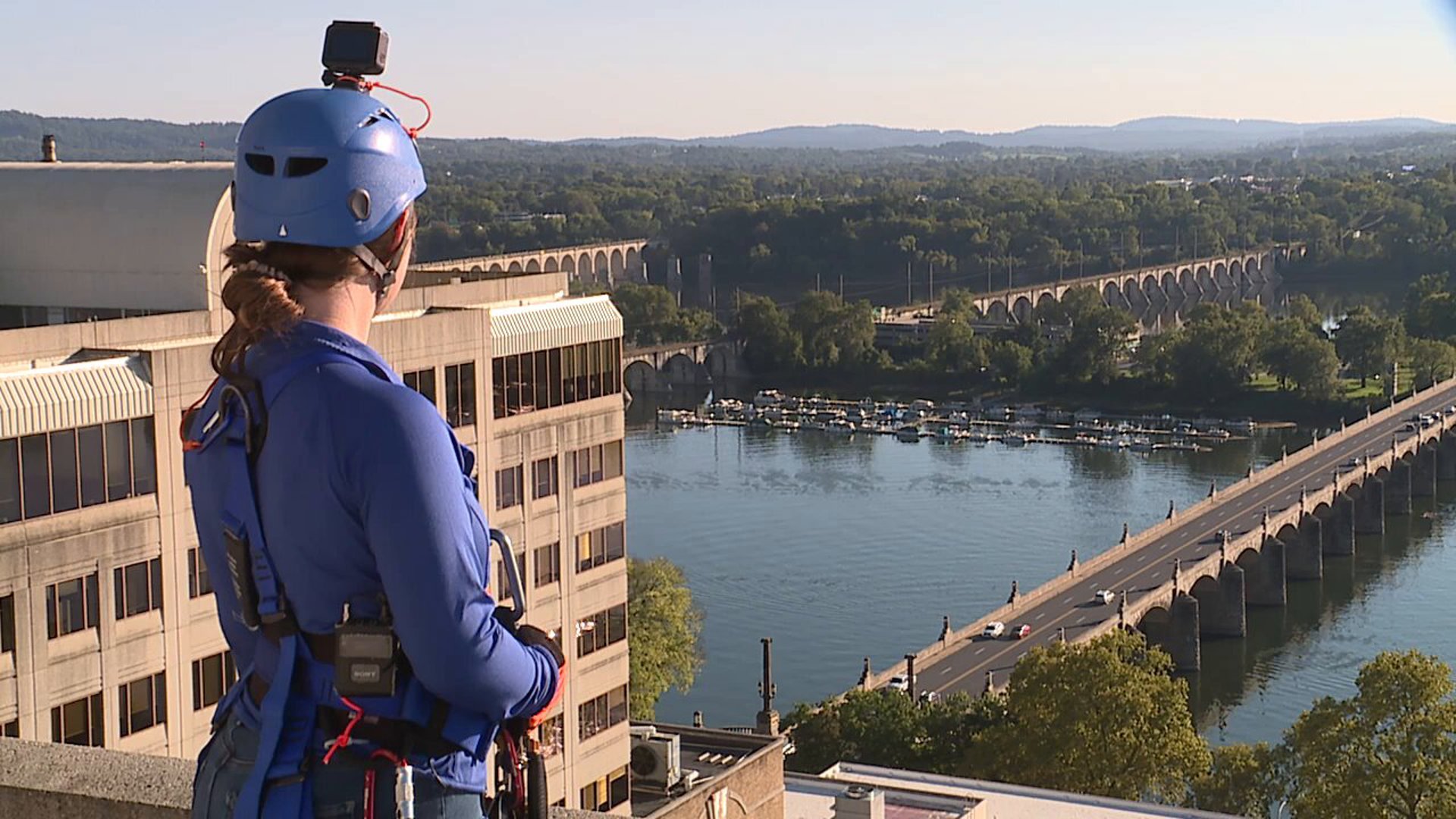 Donors take the plunge down a Harrisburg skyscraper to support a mentorship program serving Central Pennsylvania.