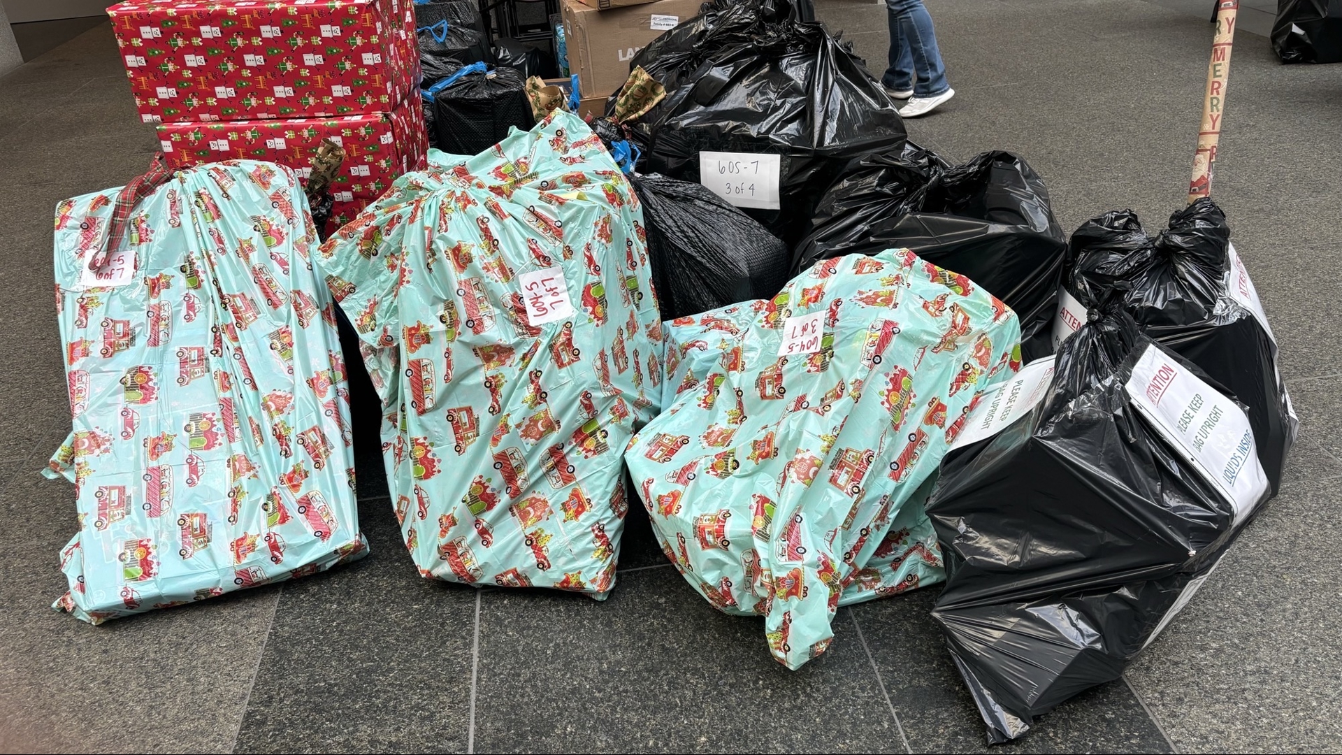 The project delivered Holiday gifts to over 600 people, including over 130 families and 60 seniors.