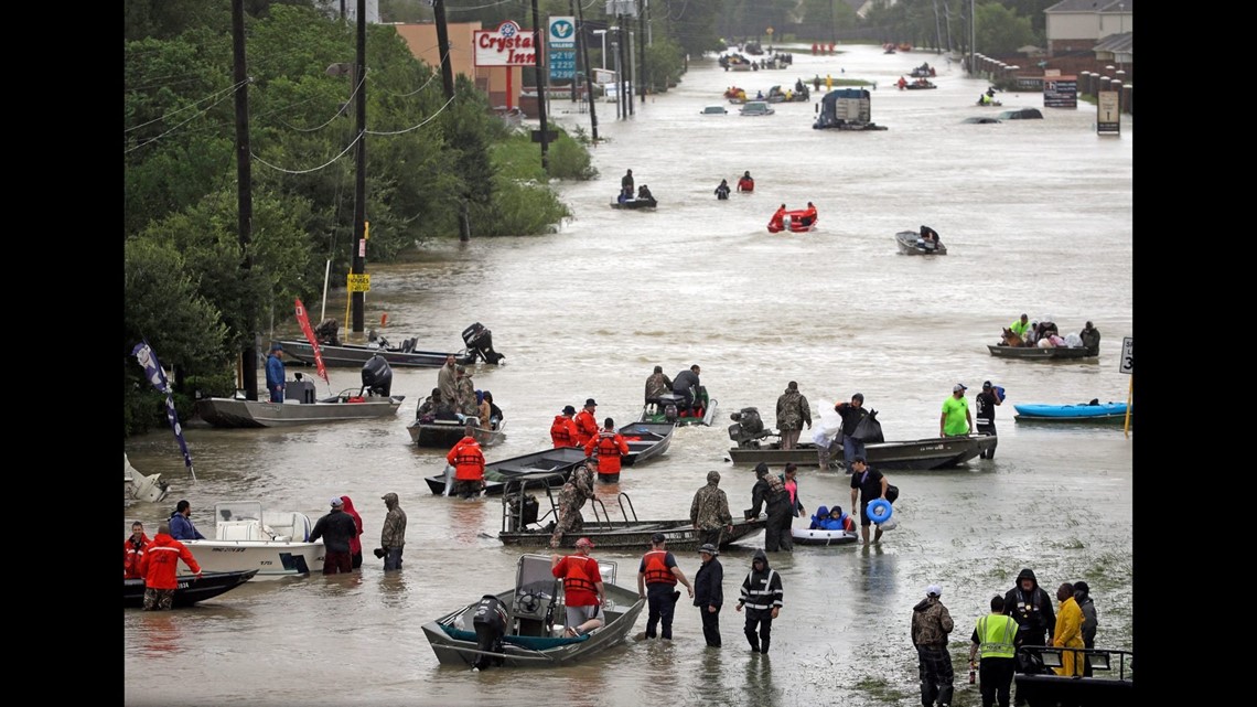 houston tx hurricane harvey woman jumps bac into water The Latest: 3,000 people rescued from flooding in After 30 inches of rain,