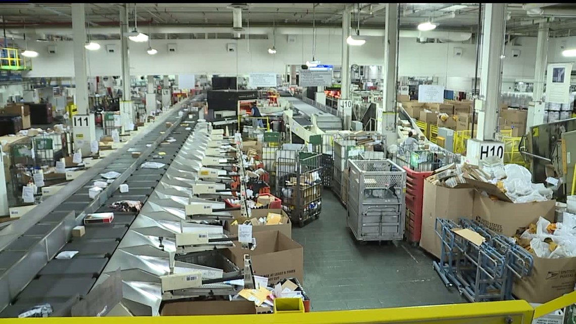 Behind the scenes look at mail processing center around the holidays