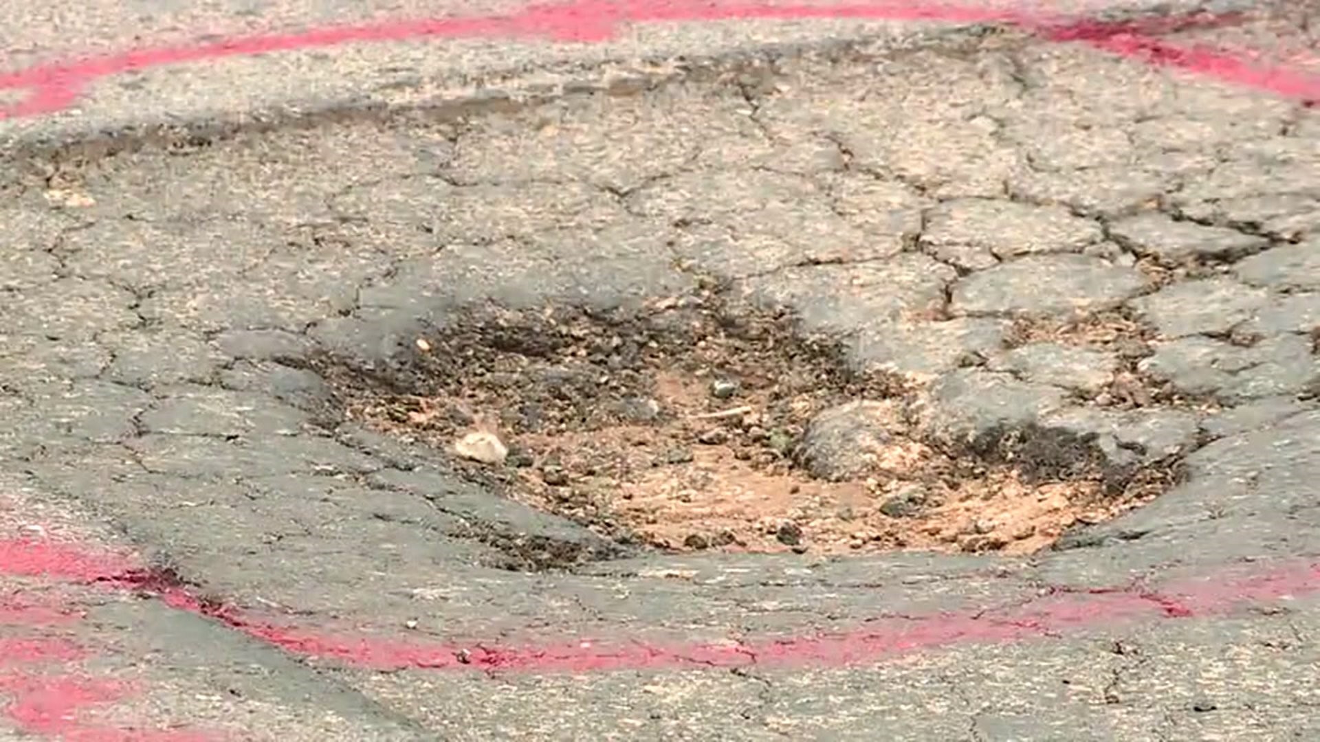 X-Rated Graffiti Forces Pothole Fixes