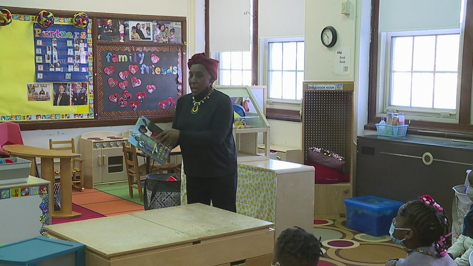 Shellie Moore-Guy read her book, "How Little Billy Learned to Play" to a group of "Head Start" students in Rock Island on Friday.