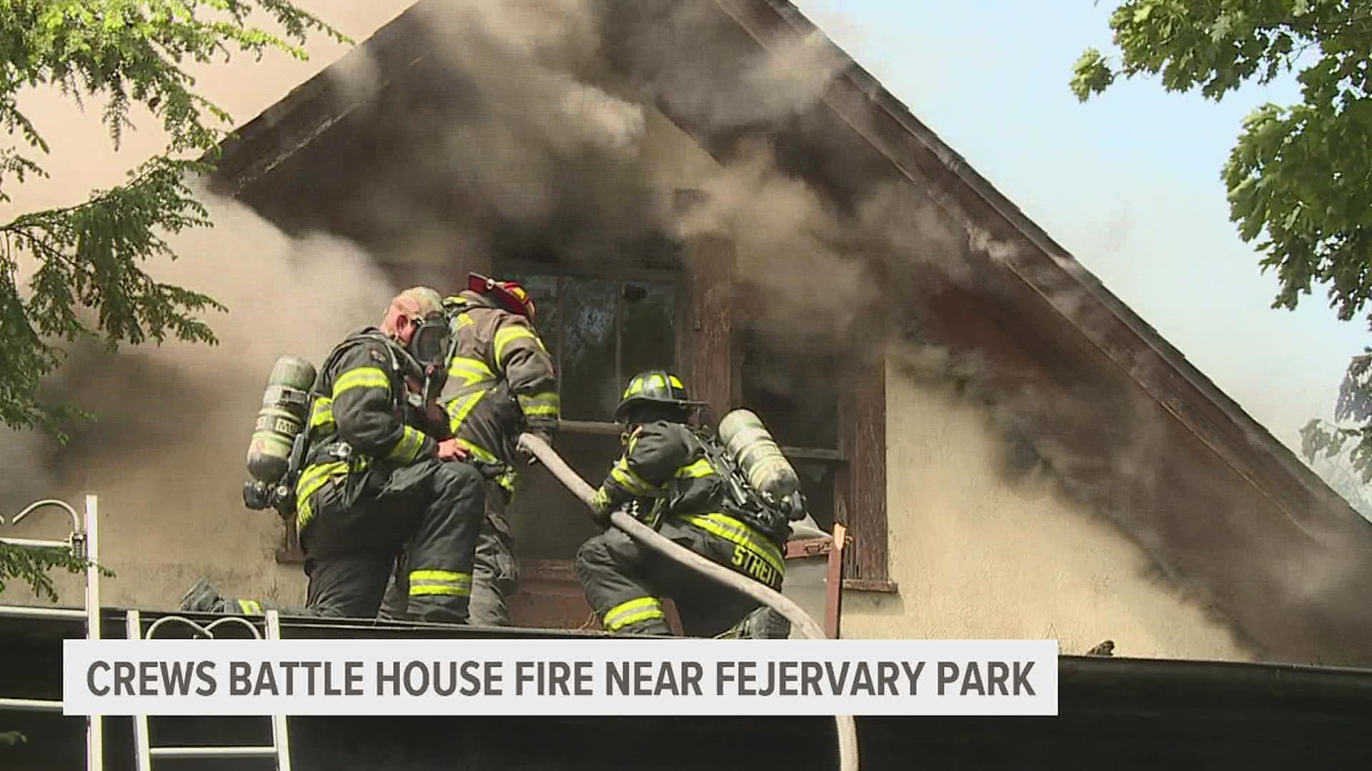 Davenport firefighters battled a house fire at a single-family home on Saturday afternoon