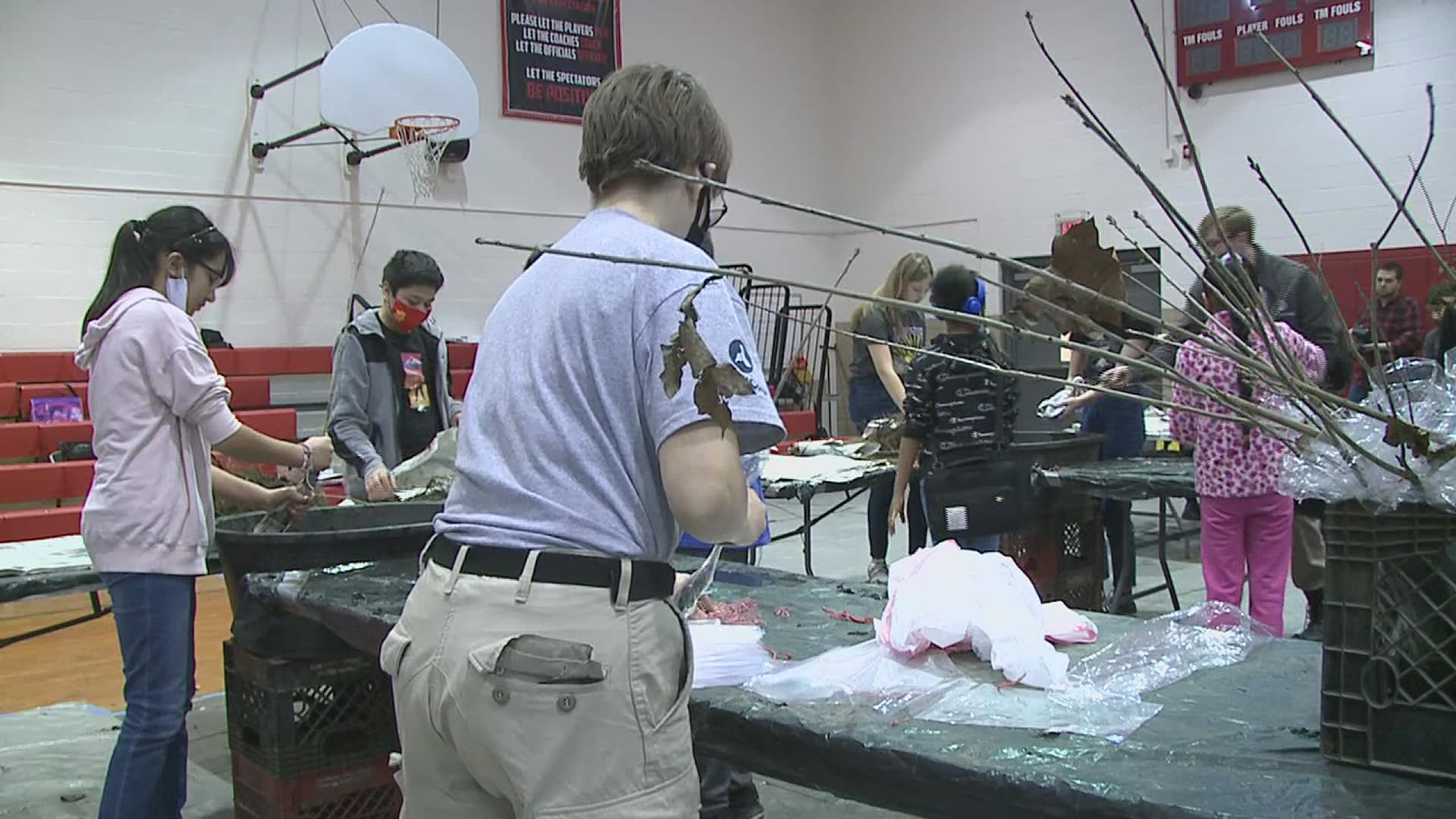 Living Land and Waters is visiting eight area schools in the Quad Cities to teach students about tree planting.