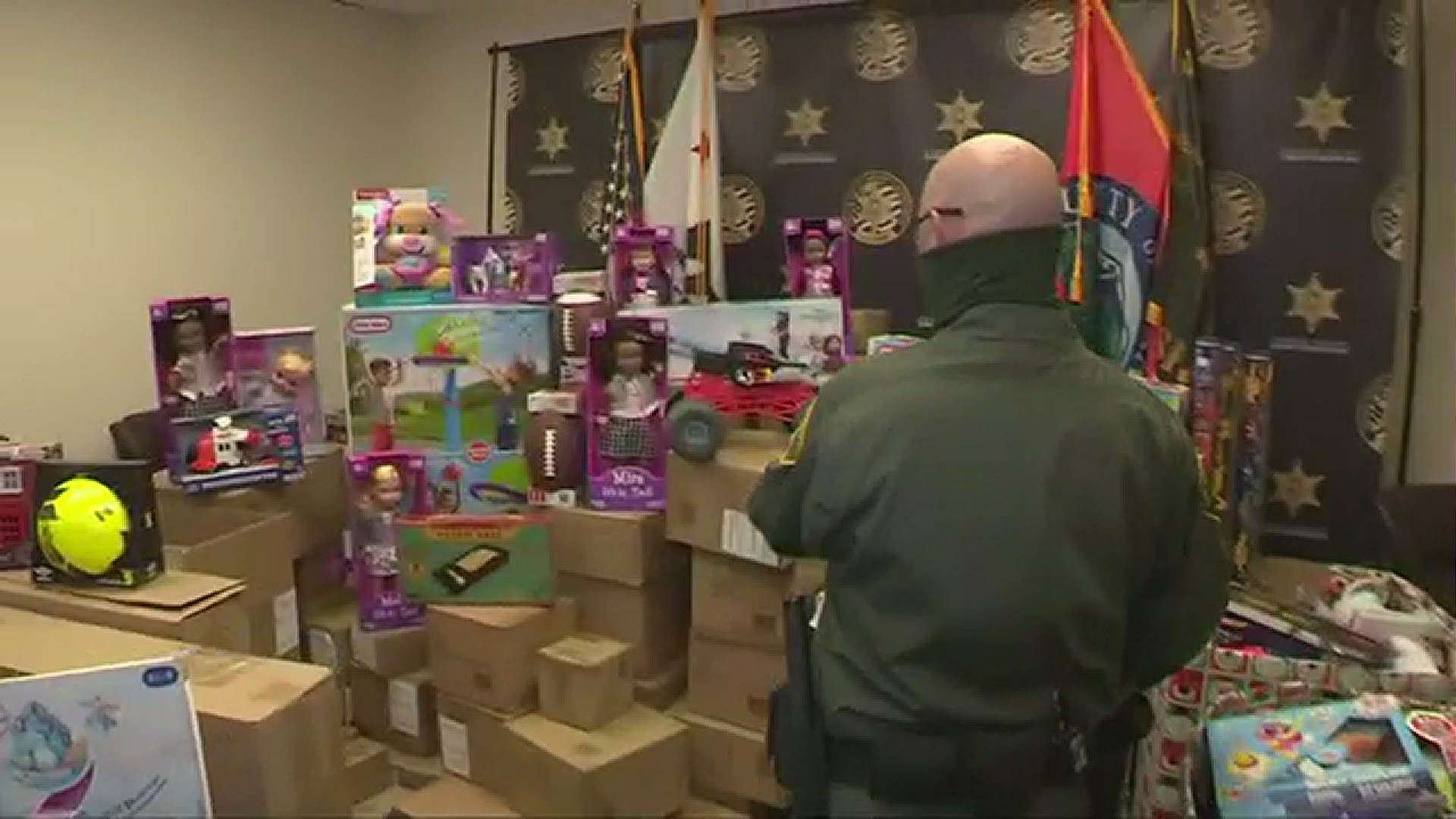 A California deputy is donating presents to the children's home that took him in as a baby.