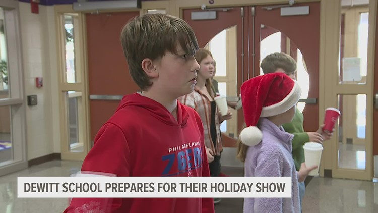 The show must go on: DeWitt teachers team up for annual winter program without a music teacher
