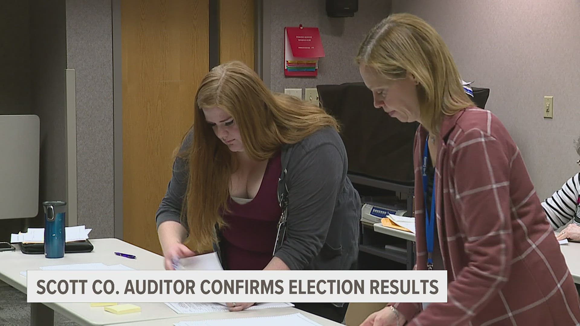 Three officials hand-counted the ballots to confirm that the totals matched the machine count.