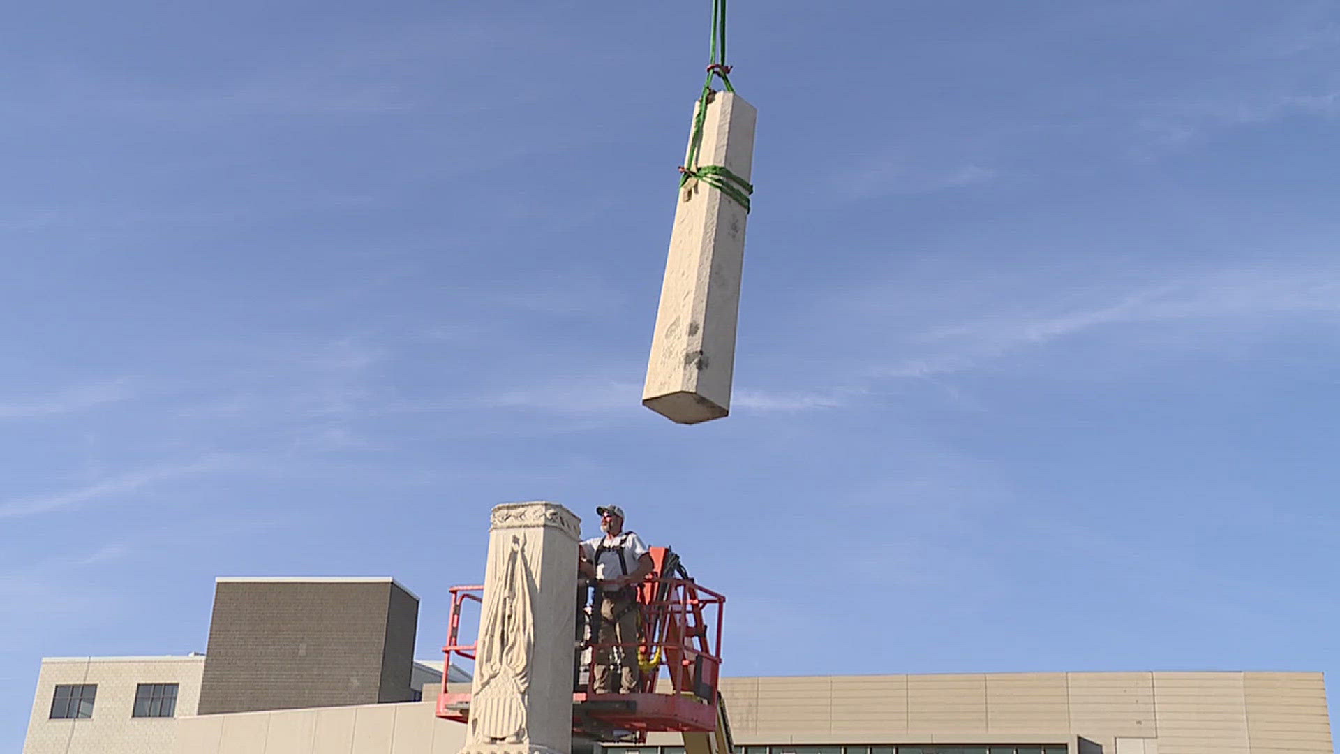 Portions of the monument's pedestal were taken apart on Tuesday in preparation for the final restoration.