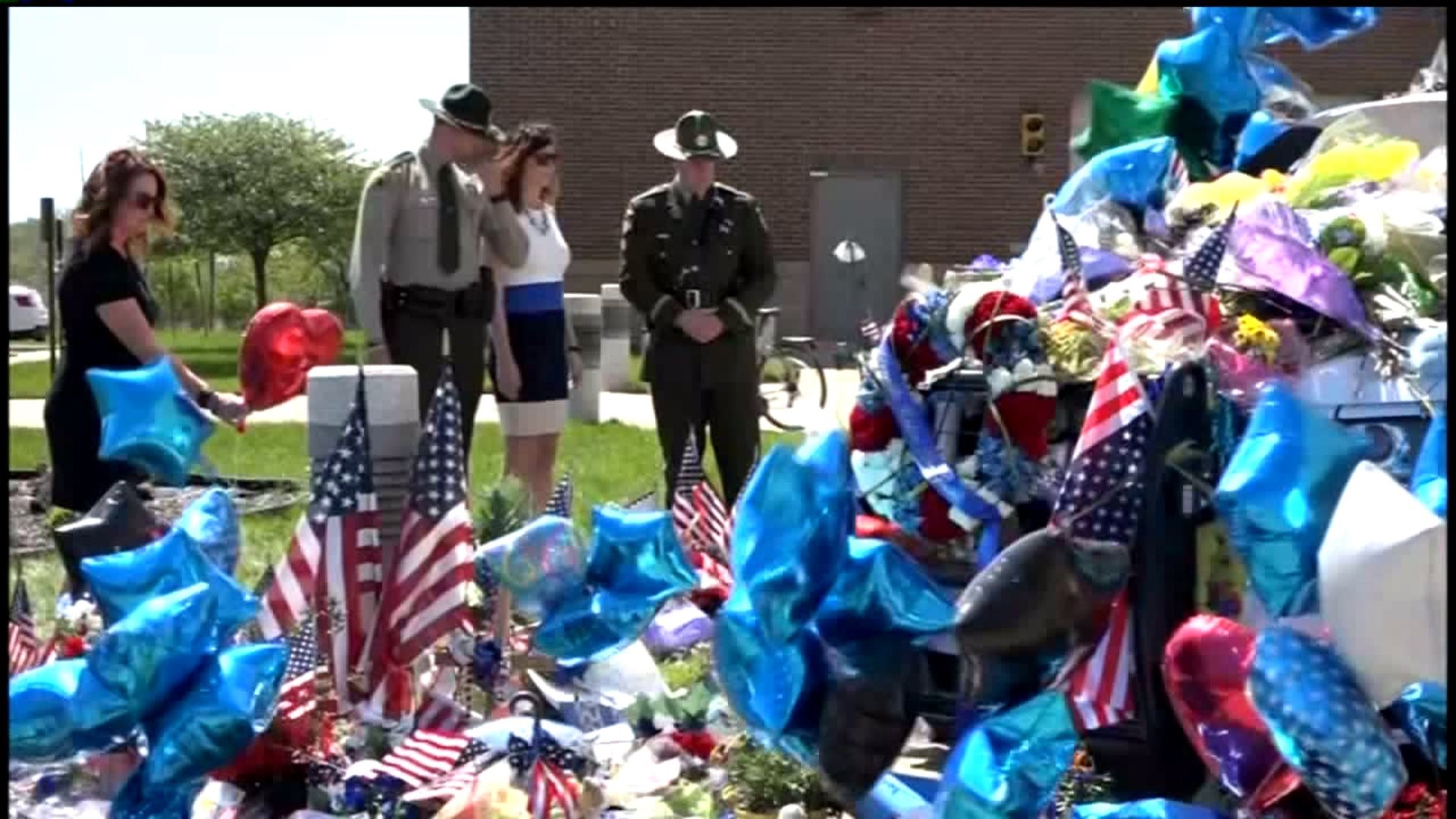 Mourners pay respects to fallen Iowa officer