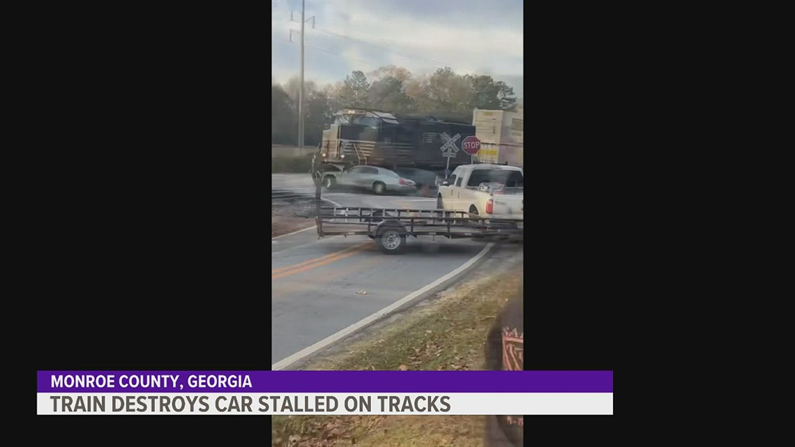 Caught on camera: Train destroys car after stalling on tracks in ...
