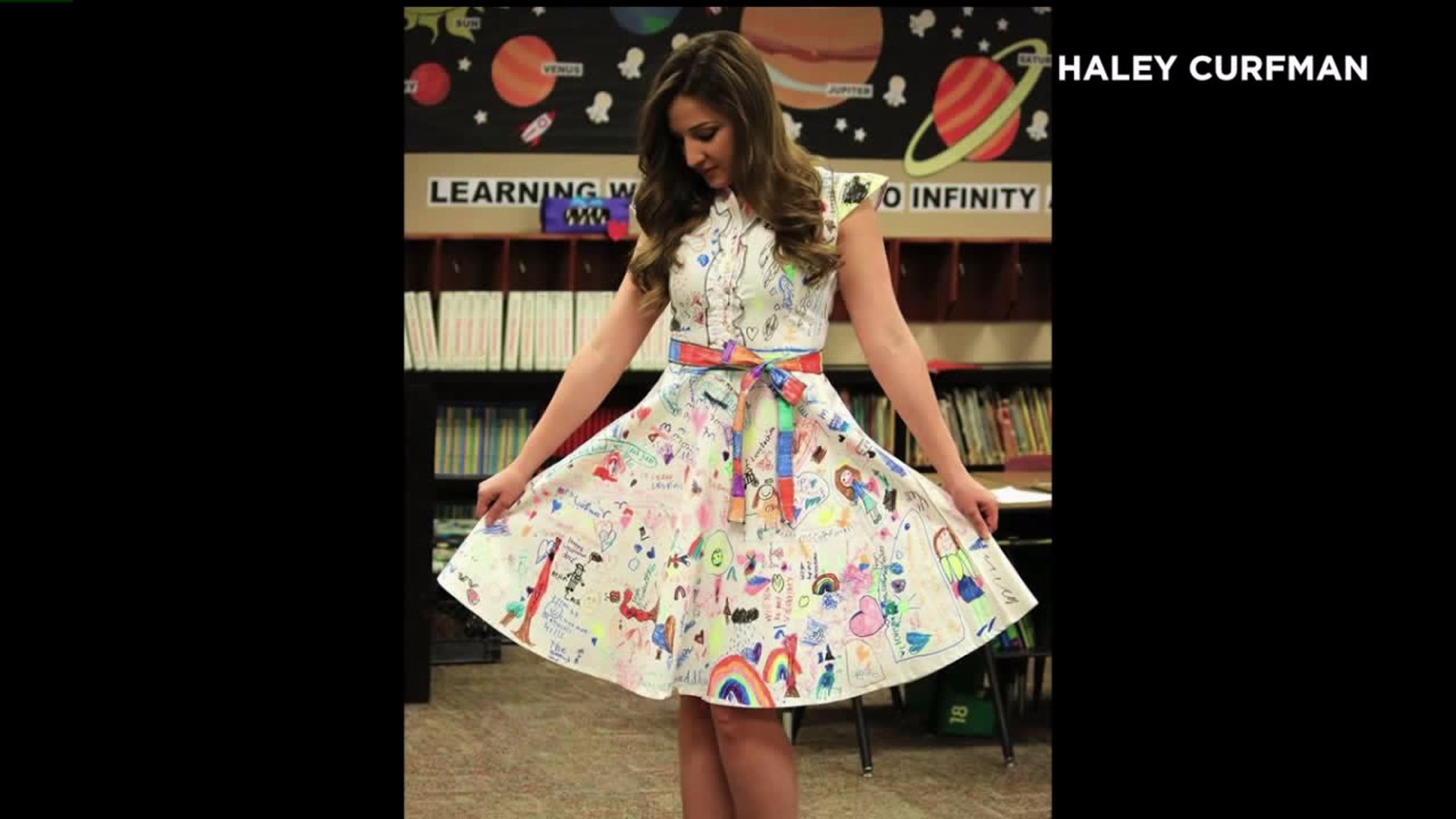 Teacher lets students draw on her white dress