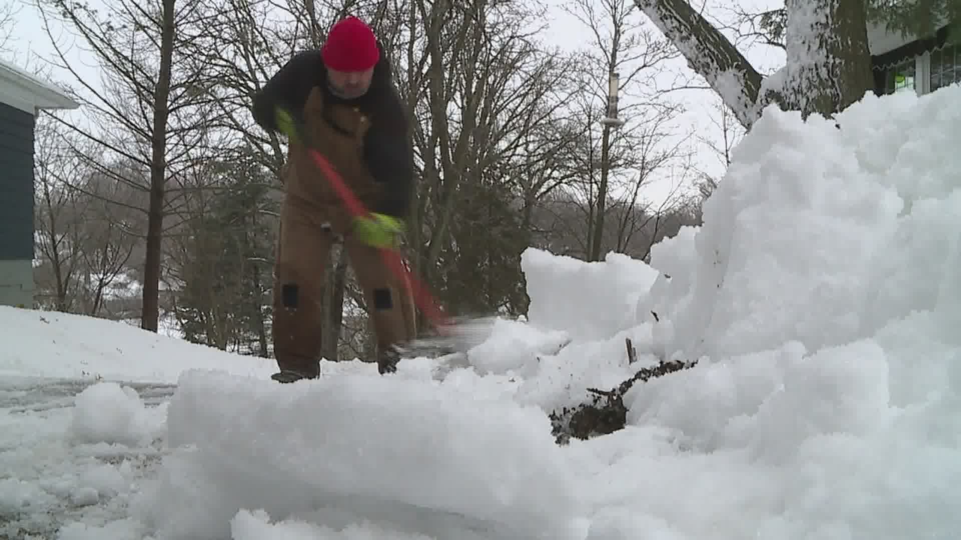 Matt Sawvell and four others cleared 12 driveways and a parking lot, all before 9:30 a.m. on Wednesday.