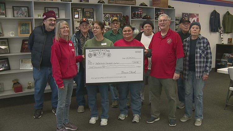 WATCH: Veterans Car Club donates $1,000 to QC Veterans Outreach Center