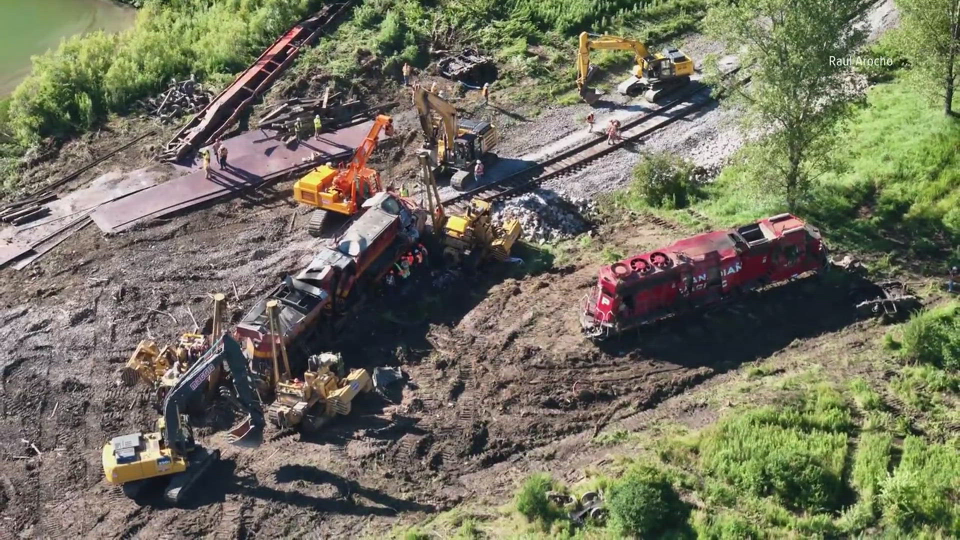 Two people are hospitalized after a rollover crash in Jo Daviess County, and Muscatine County transportation officials are investigating a train derailment.