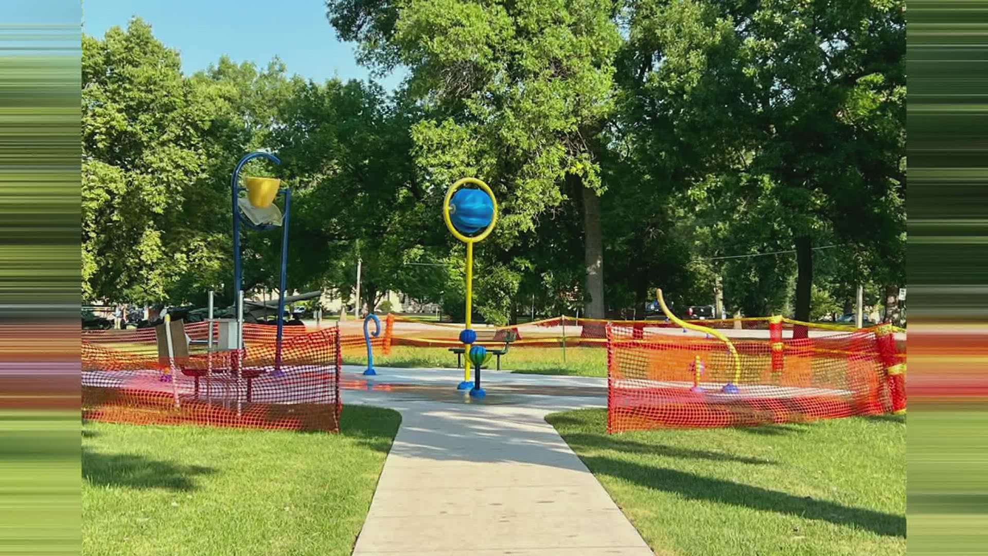 The play area and splash pad are free and open to the public in Memorial Park.