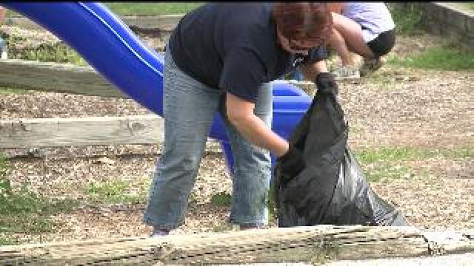 Church group cleans to prep area for Moline students returning to school