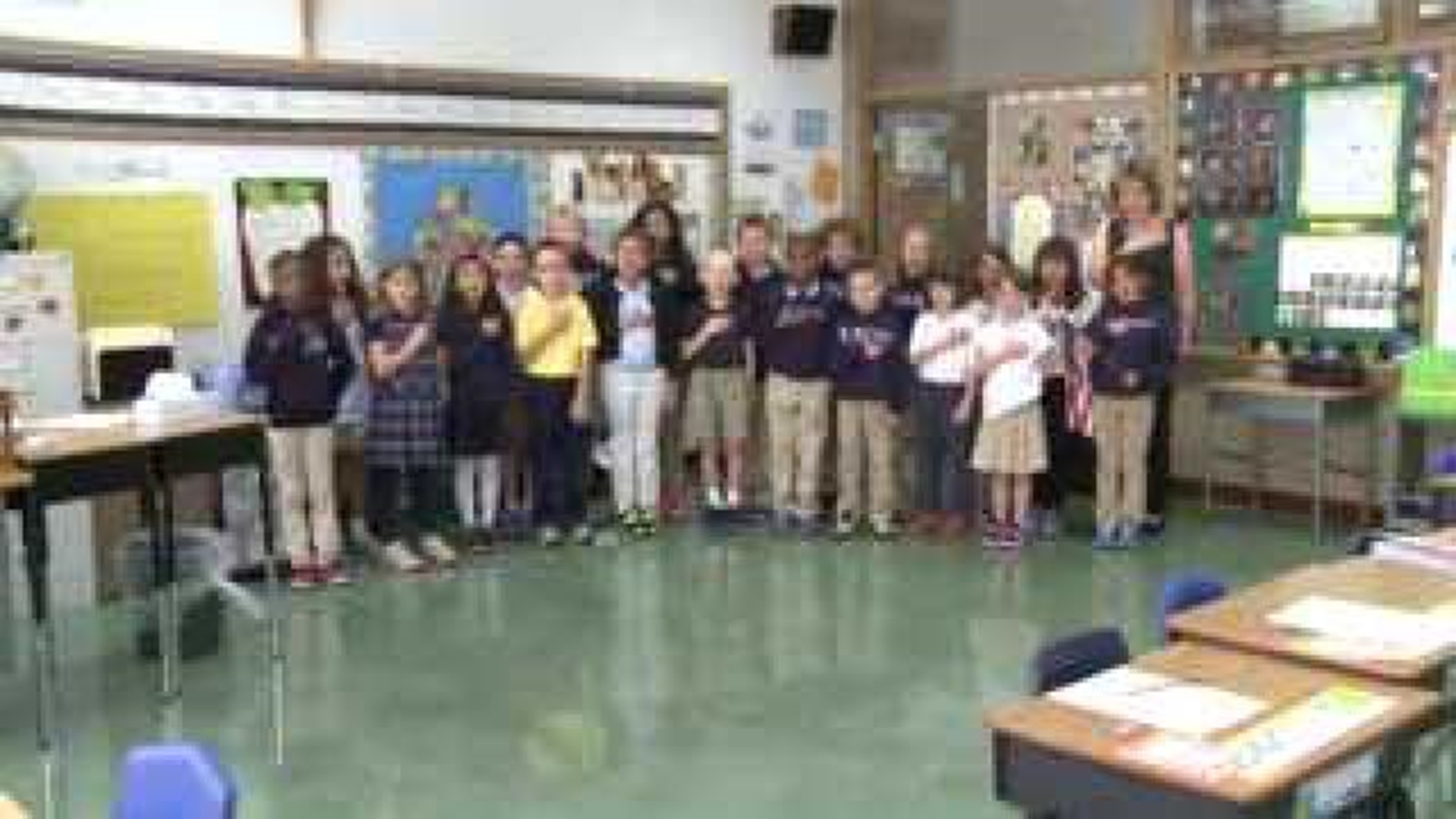 Mrs. Sharp's class recites The Pledge of Allegiance