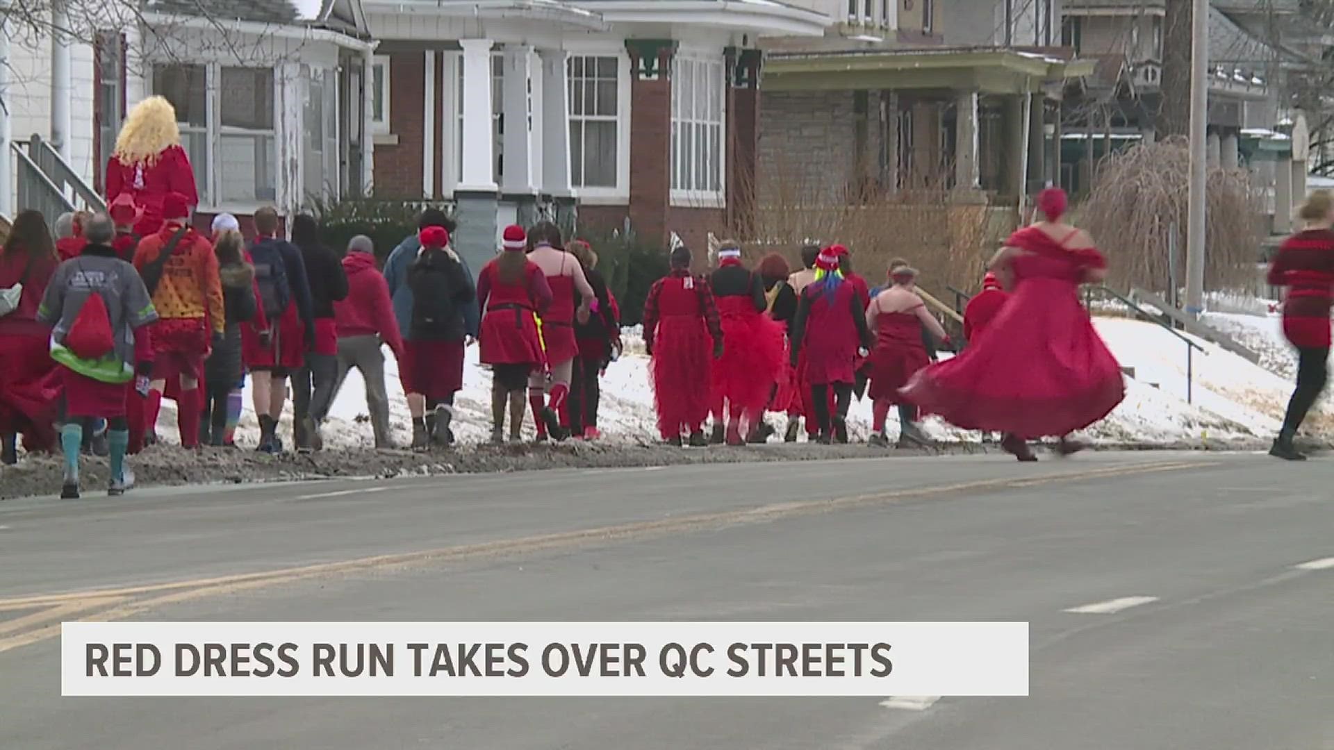 More than 150 walkers and runners took to the streets for the 12th annual 'Red Dress Run'.