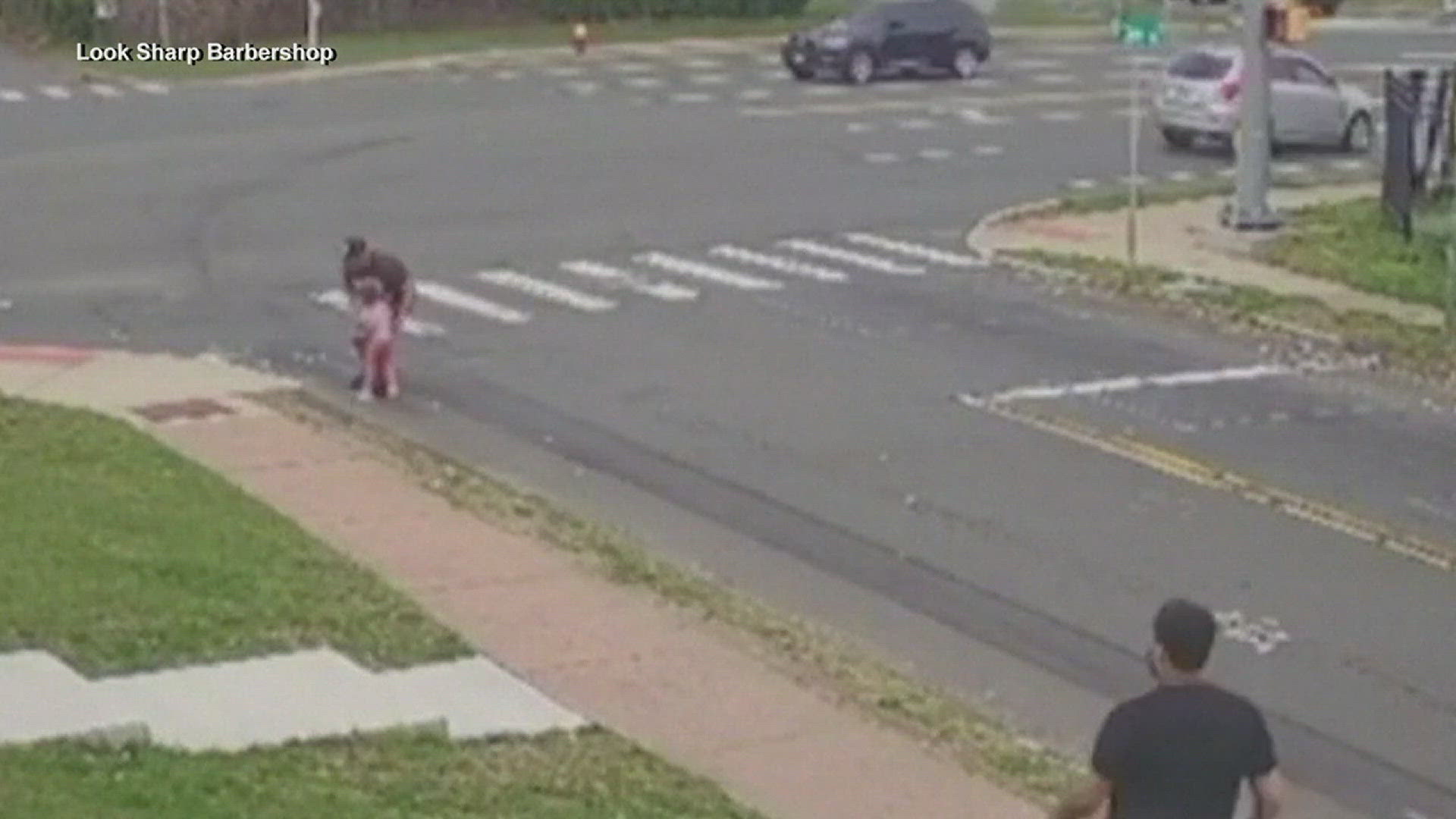 Two barbers from Connecticut are getting an enormous amount of thanks after they rushed to stop a little girl from running towards a busy intersection.