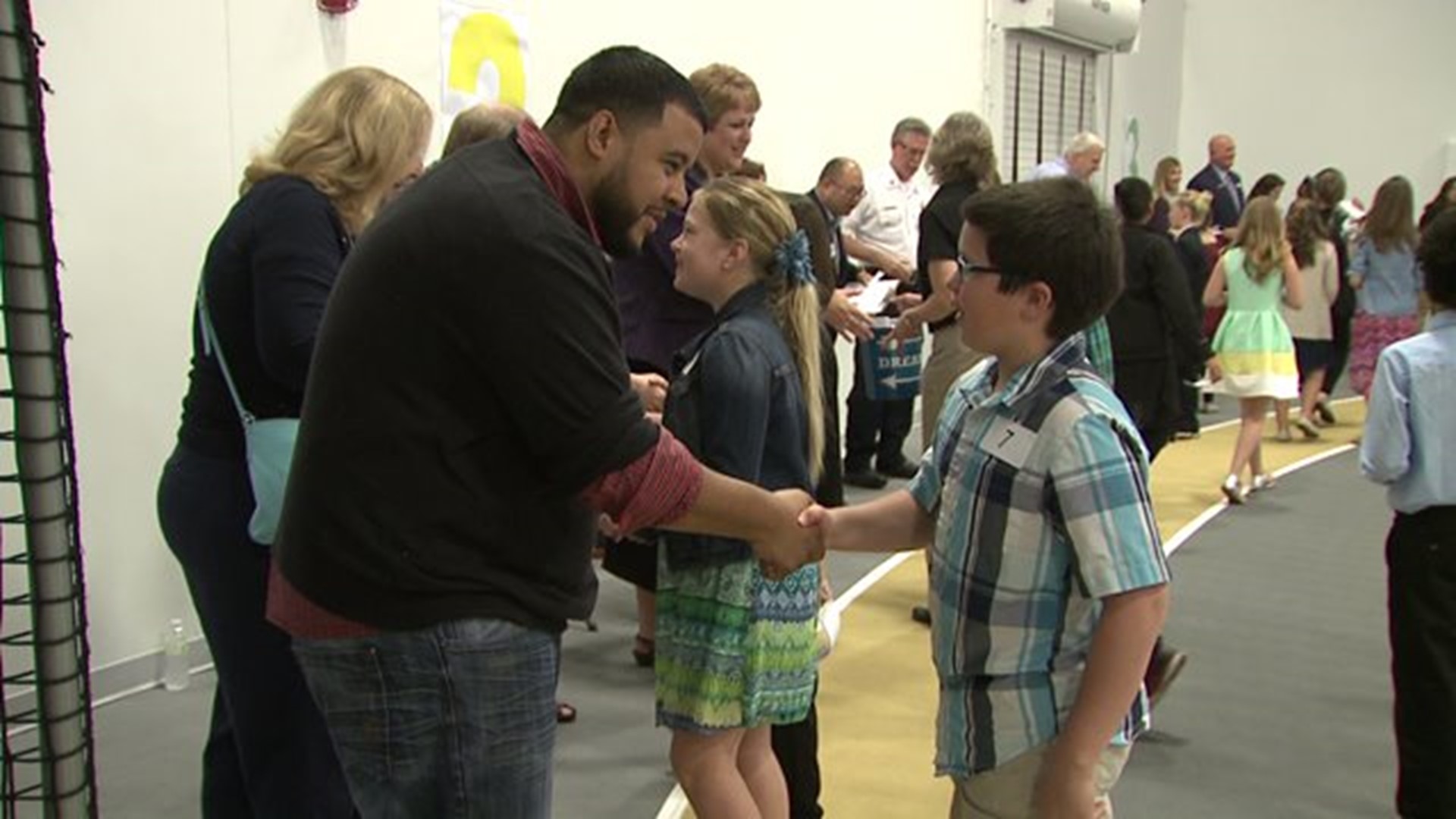 Kids learn how to make a good first impression at the Great Galesburg Shake