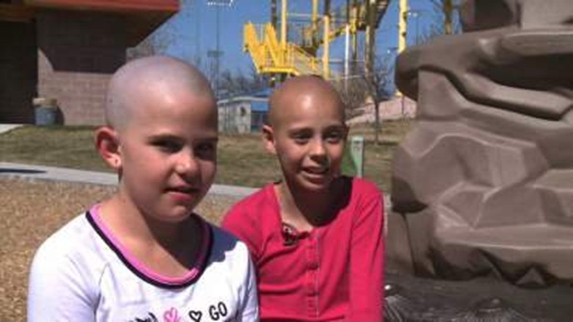 Girl fights school for right to attend class with shaved head