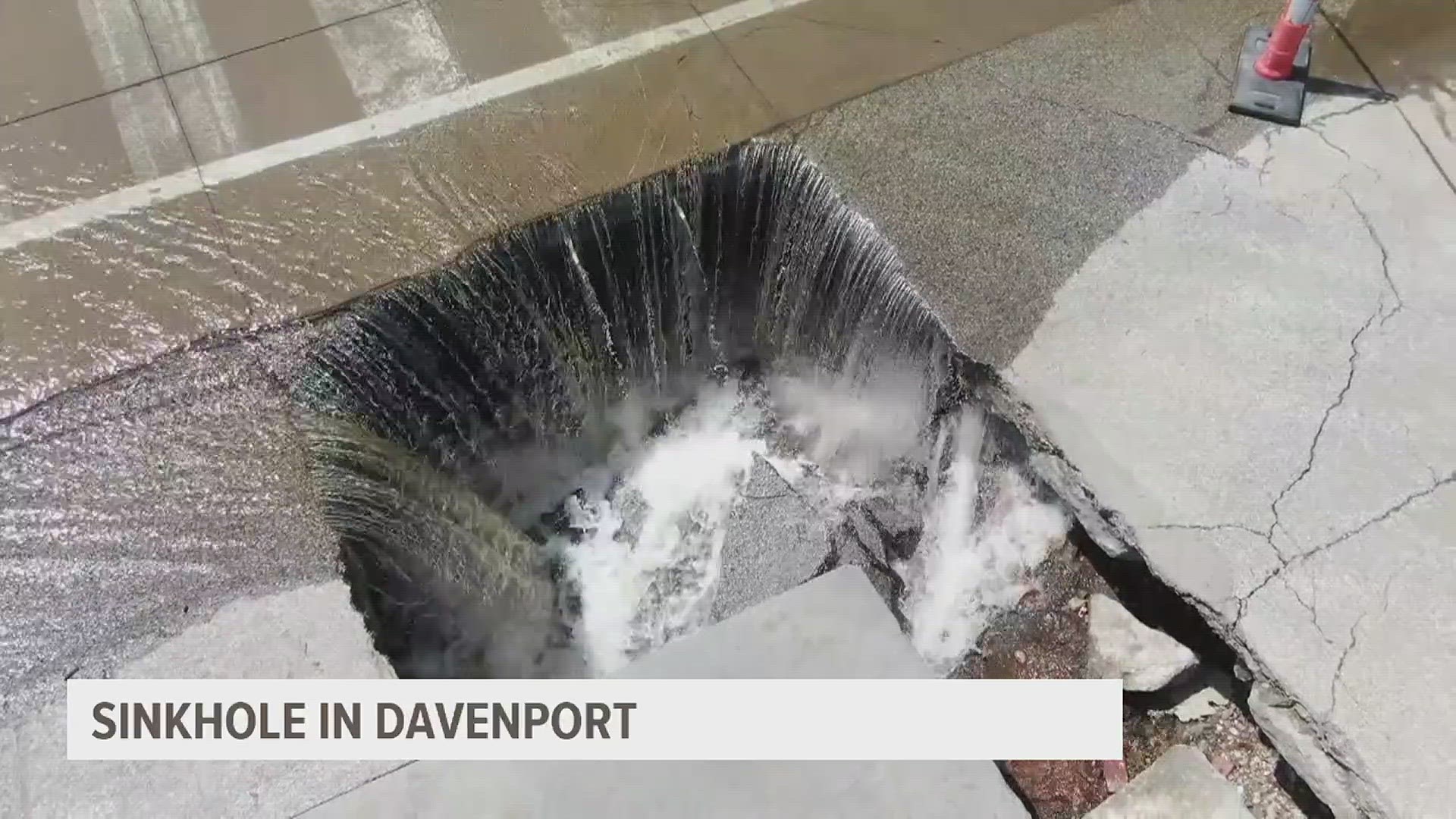 Sinkhole opens up along River Drive in Davenport | wqad.com