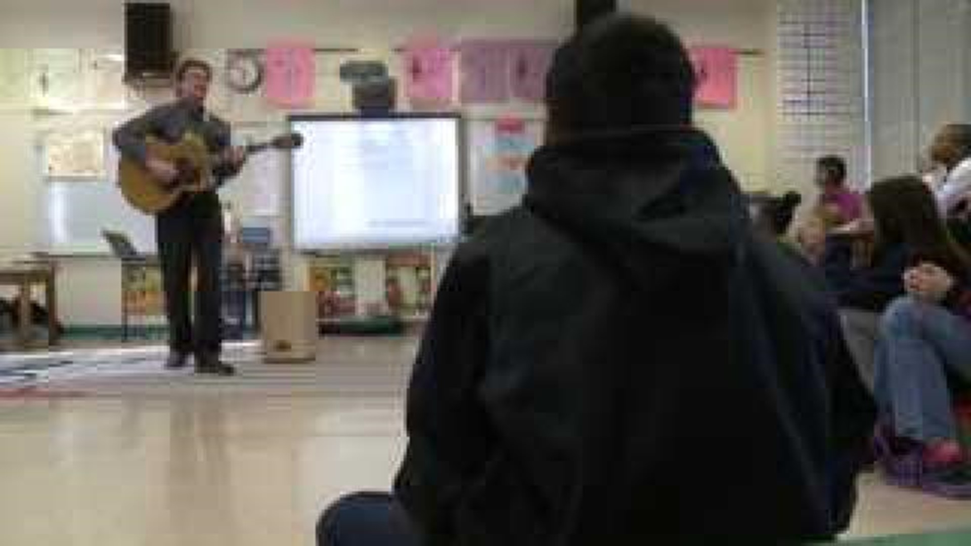 School teaching through song
