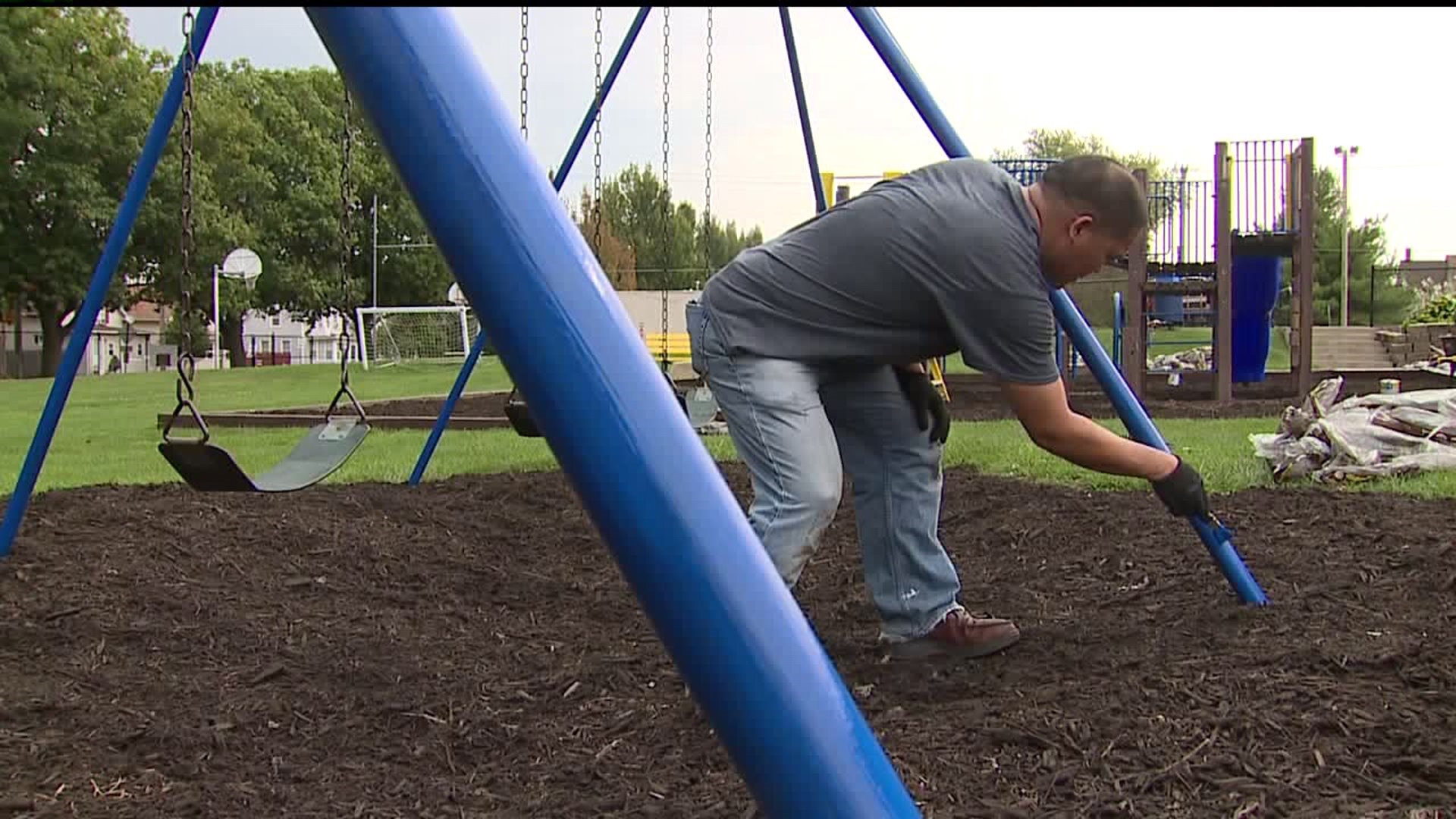 Day of Caring Cleans up Park