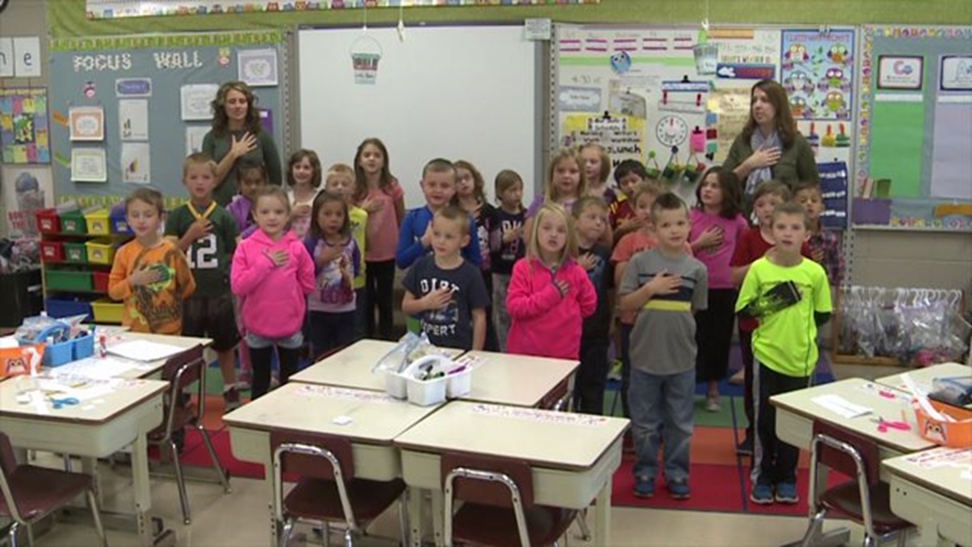 Mrs. Fetty Ward`s class says the Pledge of Allegiance