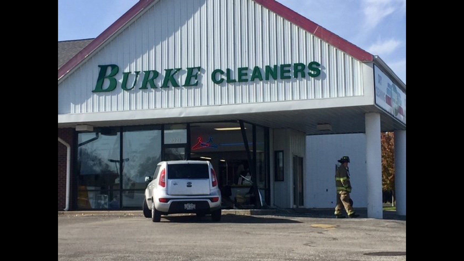 Car crashes into front entryway of Burke Cleaners in Moline