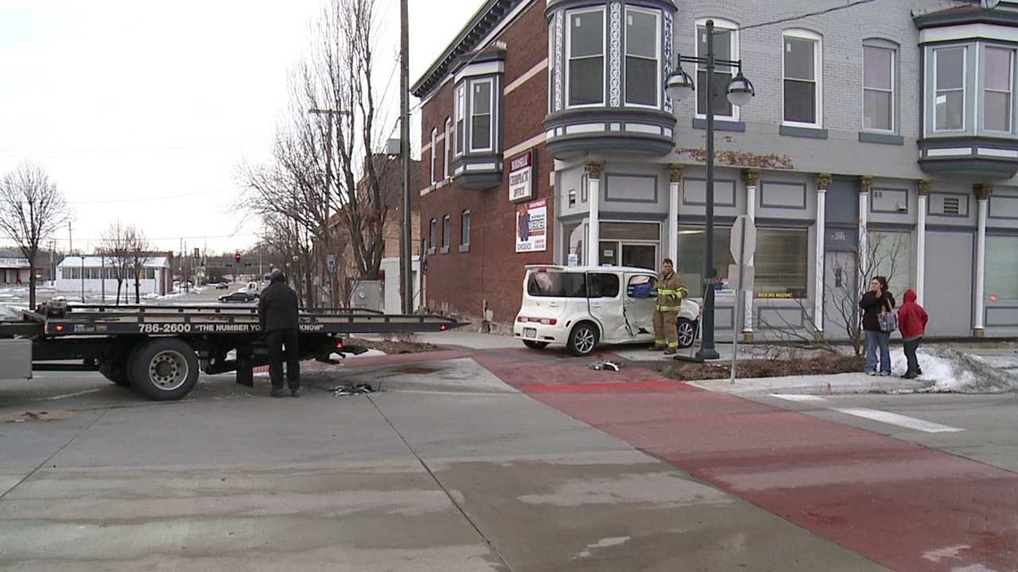 Car crashes into Moline building after collision