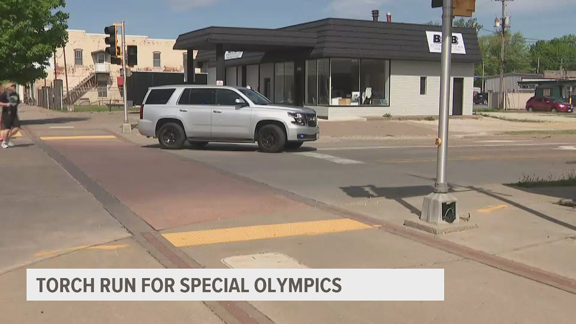 The torch's next stop will be in Ames before it's used to light the Olympic Flame at the opening ceremonies next week.