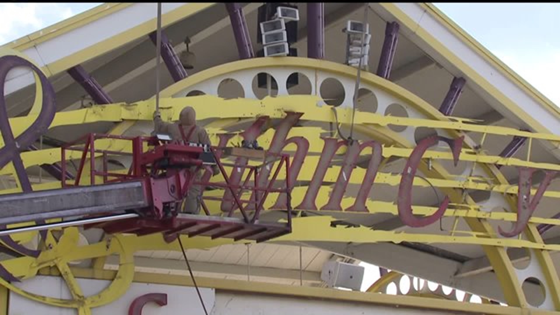 Crews remove pieces of Rhythm City canopy