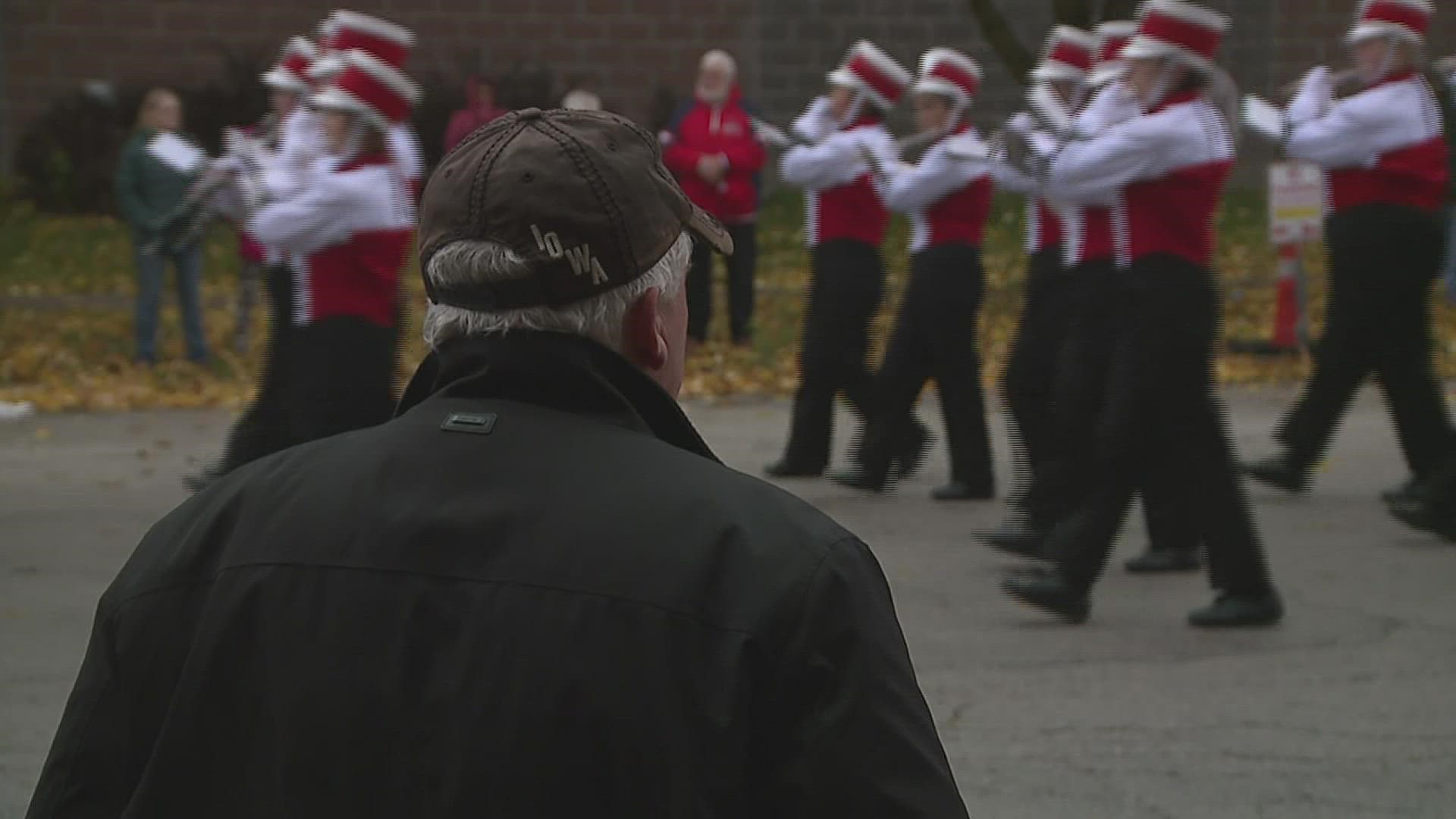 Despite the morning's rain and wind, a bundled up crowd came out to cheer on local veterans, marching bands and more.