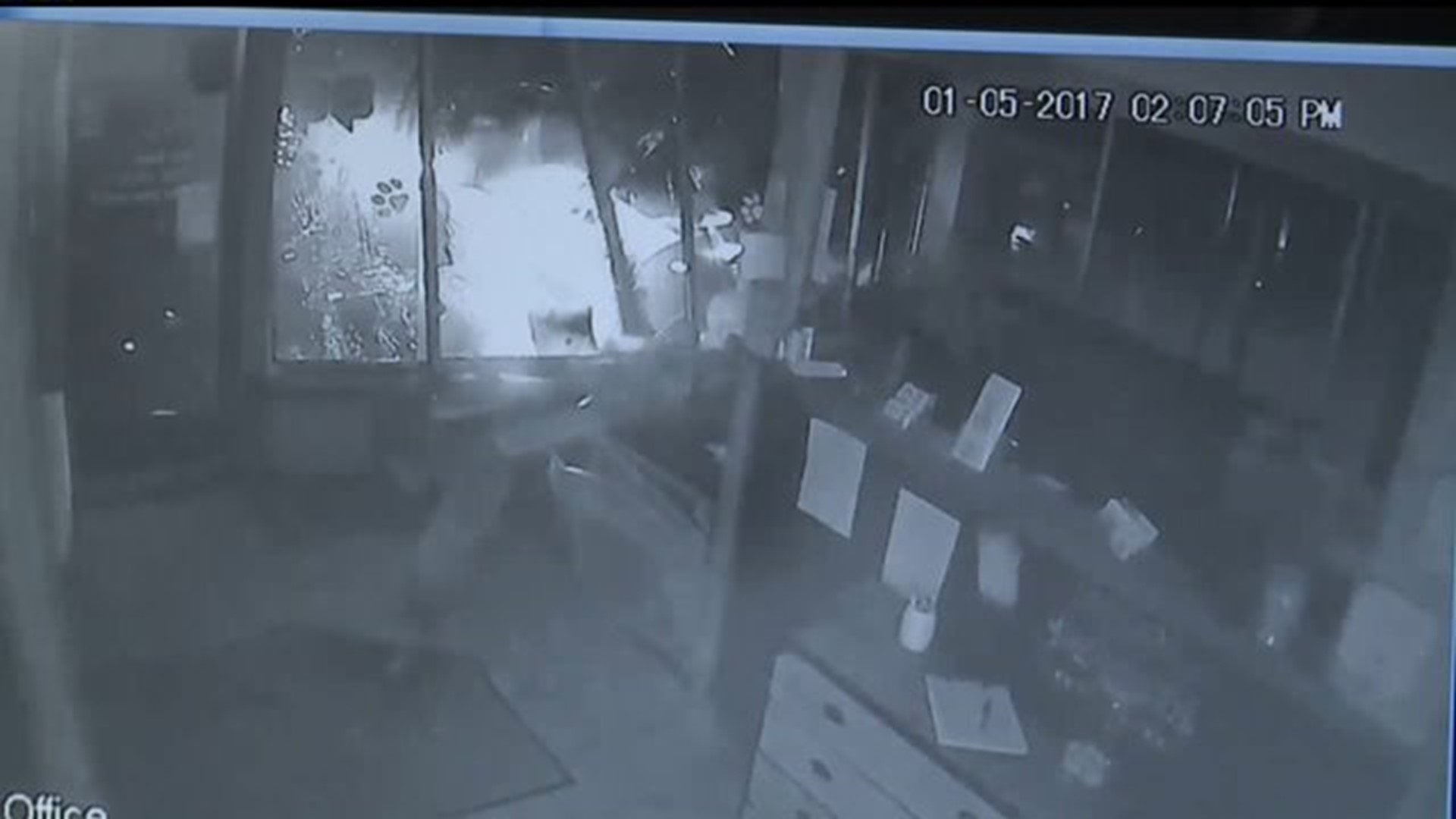 Surveillance Video of Car Crashing Into Building