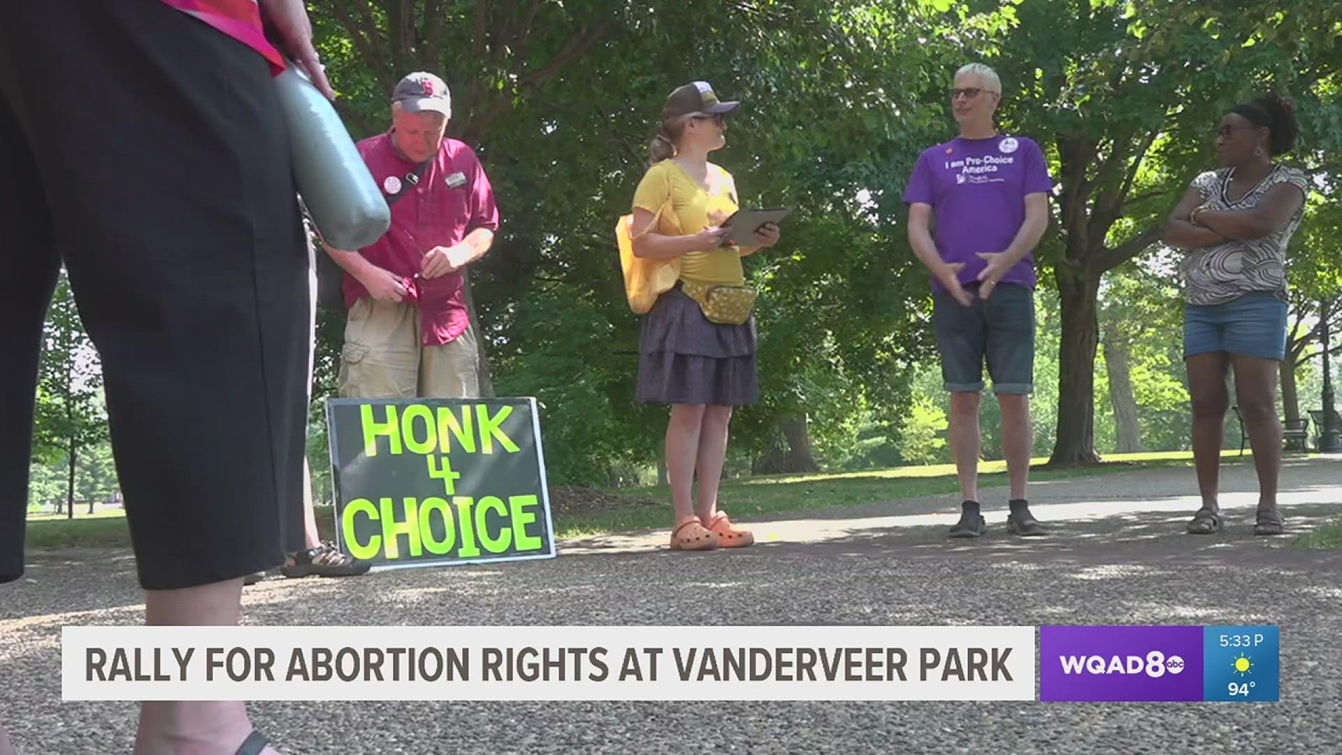 Representatives from local social justice groups held a small rally in Vander Veer Botanical Park.