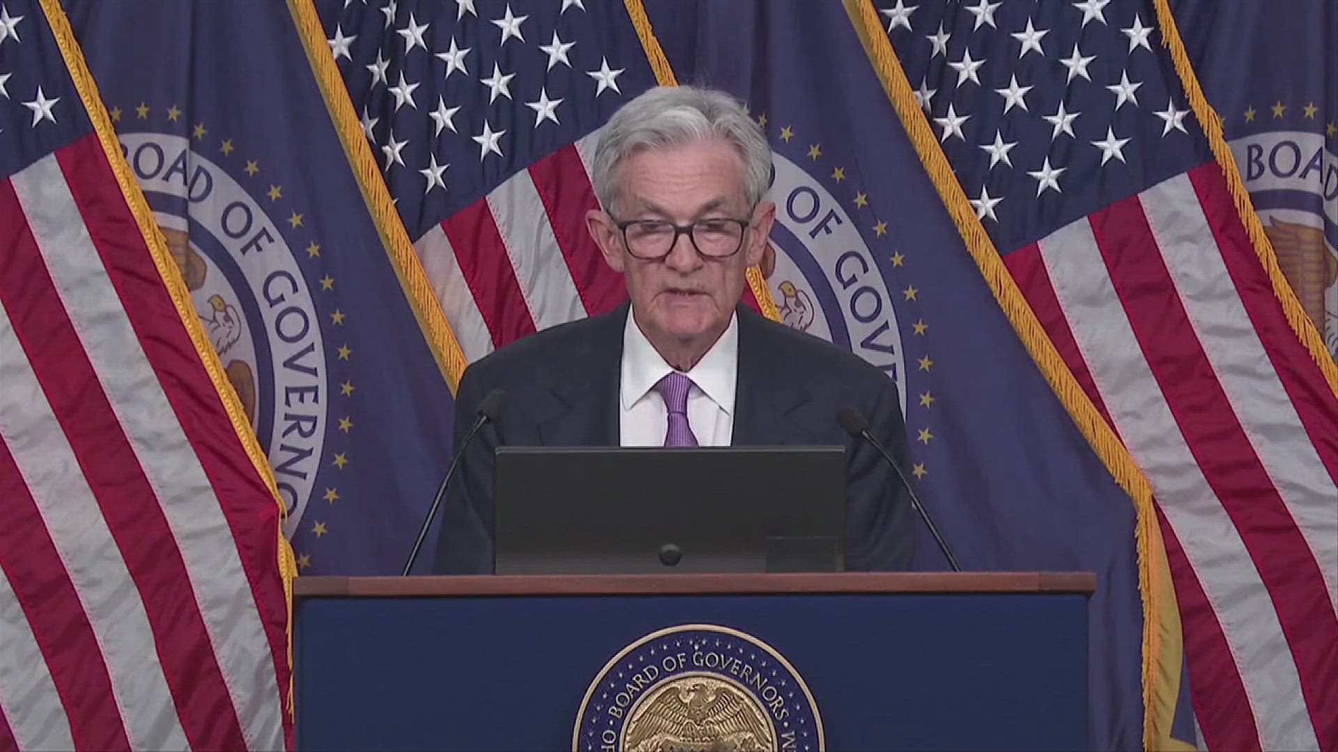 Workers with the Federal Reserve say falling inflation and slow job gains have led to their decision to decrease the national interest rate.